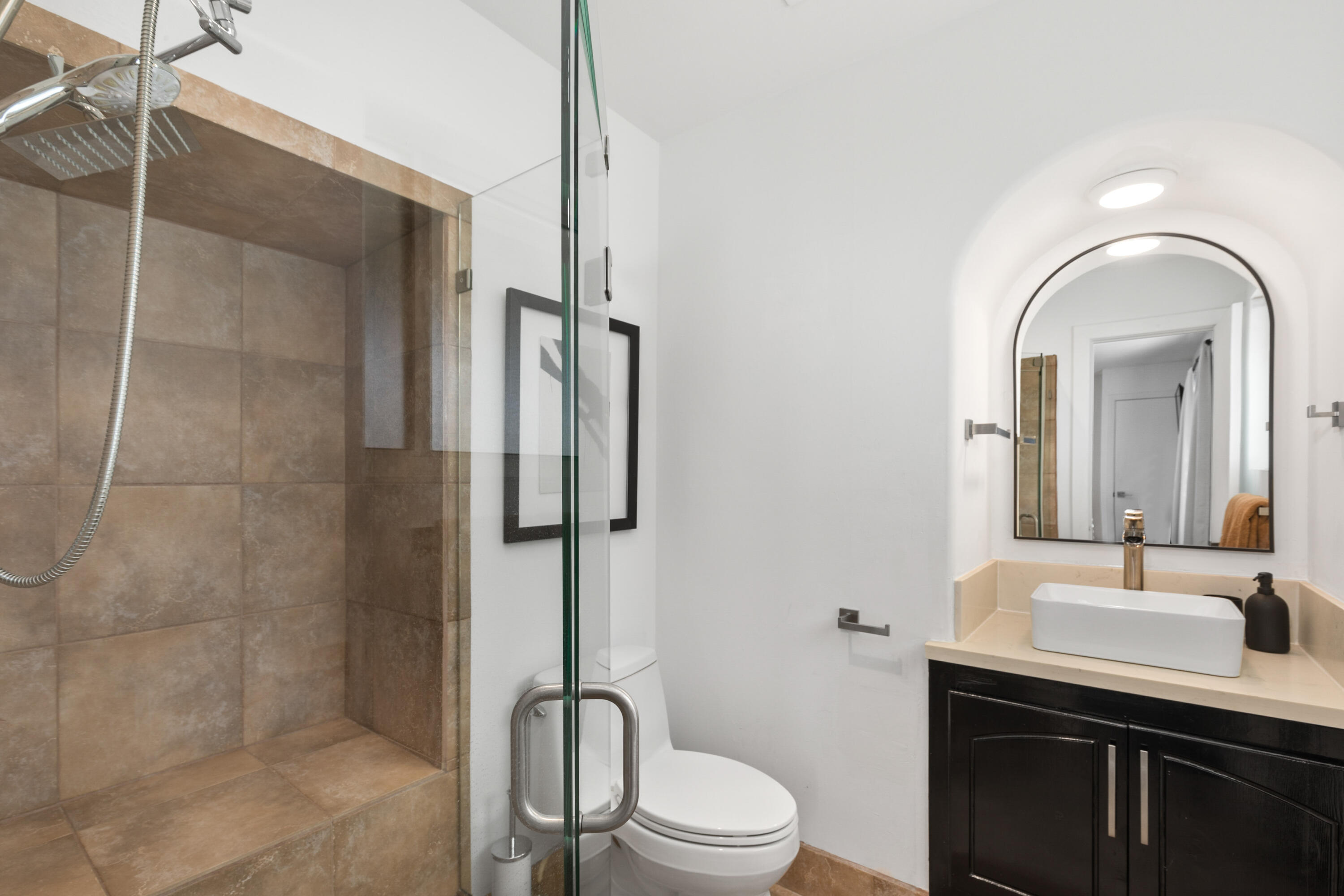 70050 Chappel Road Rancho Mirage, CA 92270 - Photo 36 of 36 a bathroom with a toilet sink and shower