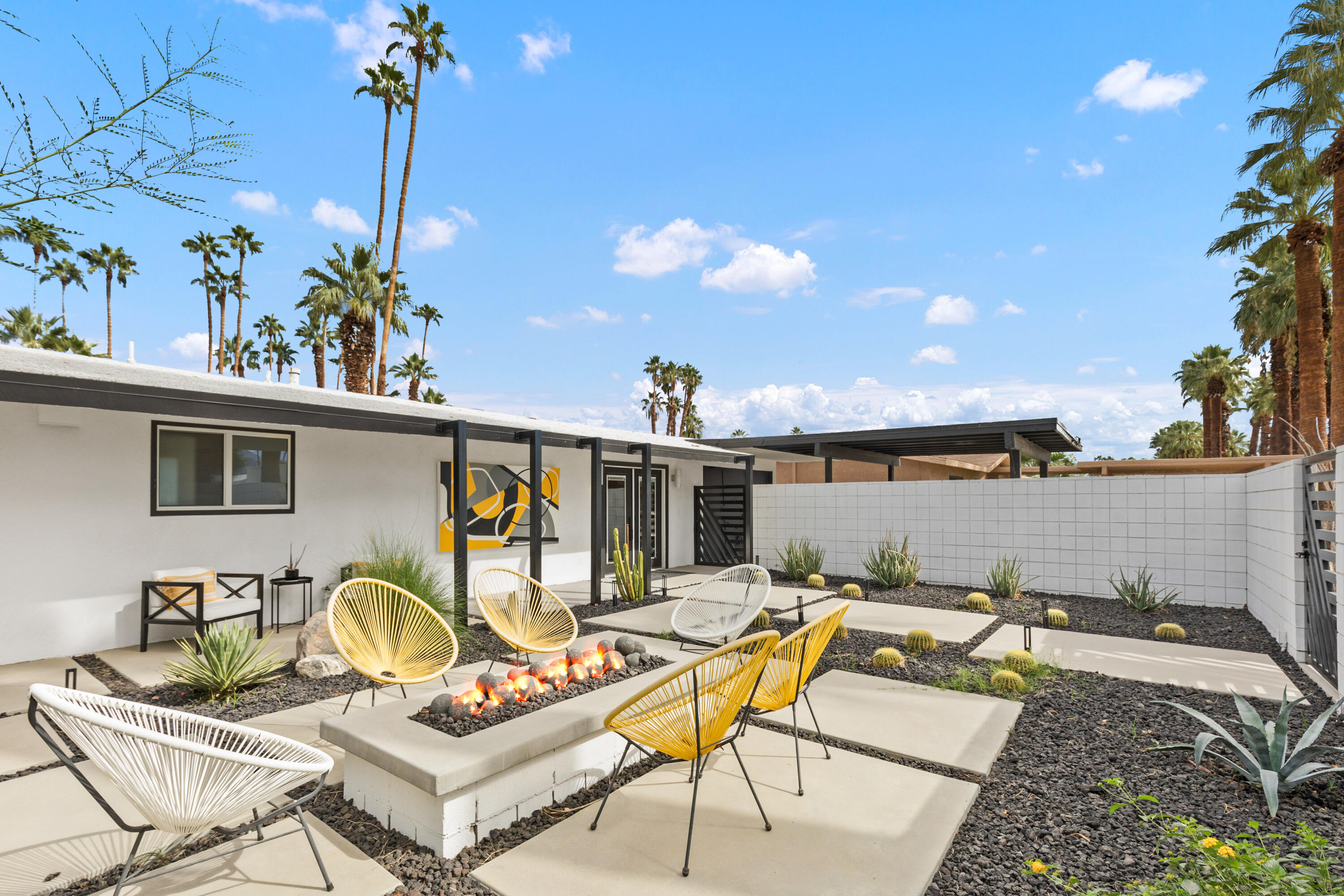 70050 Chappel Road Rancho Mirage, CA 92270 - Photo 6 of 36 a view of a chairs and table in patio