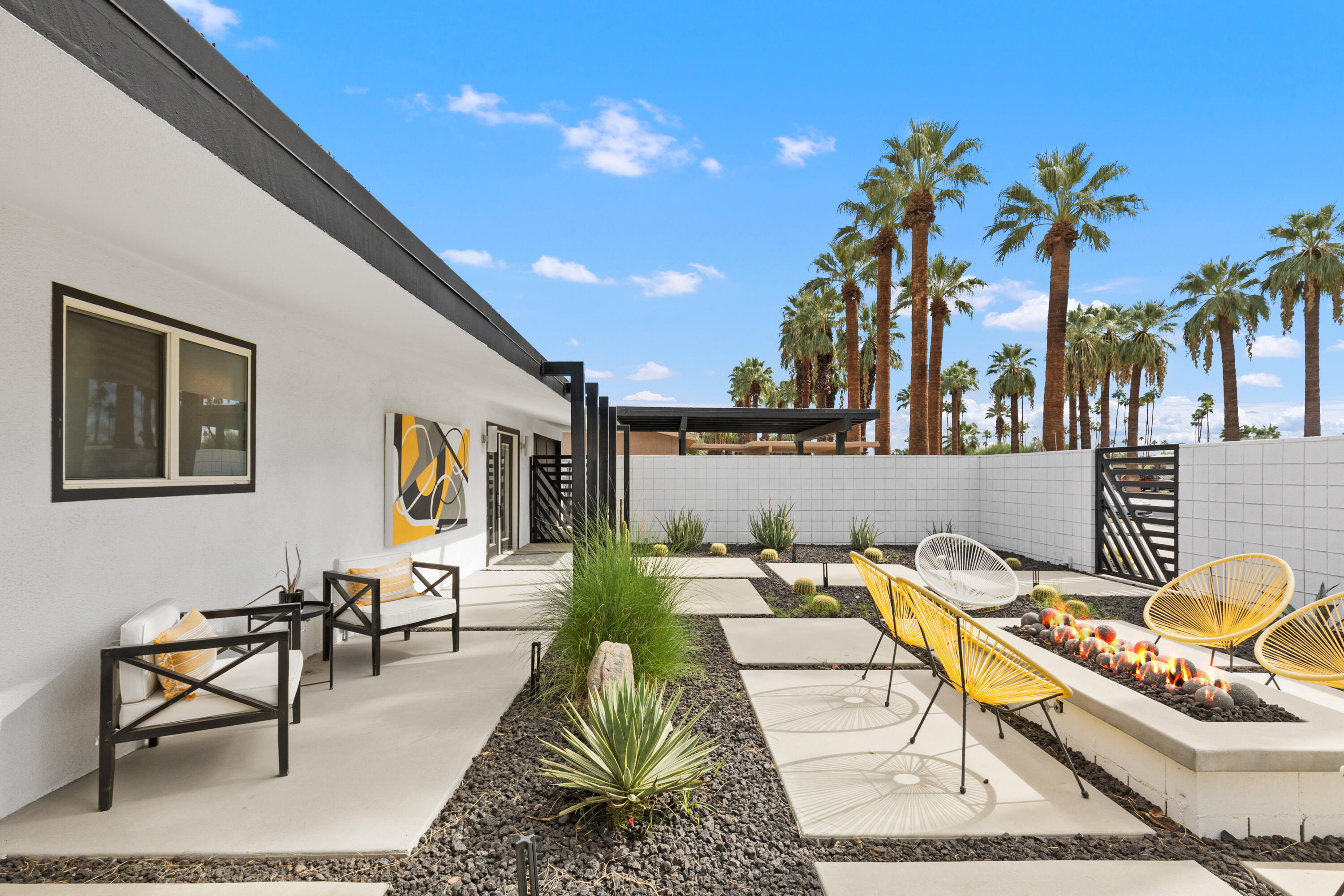 70050 Chappel Road Rancho Mirage, CA 92270 - Photo 7 of 36 a view of a patio with swimming pool