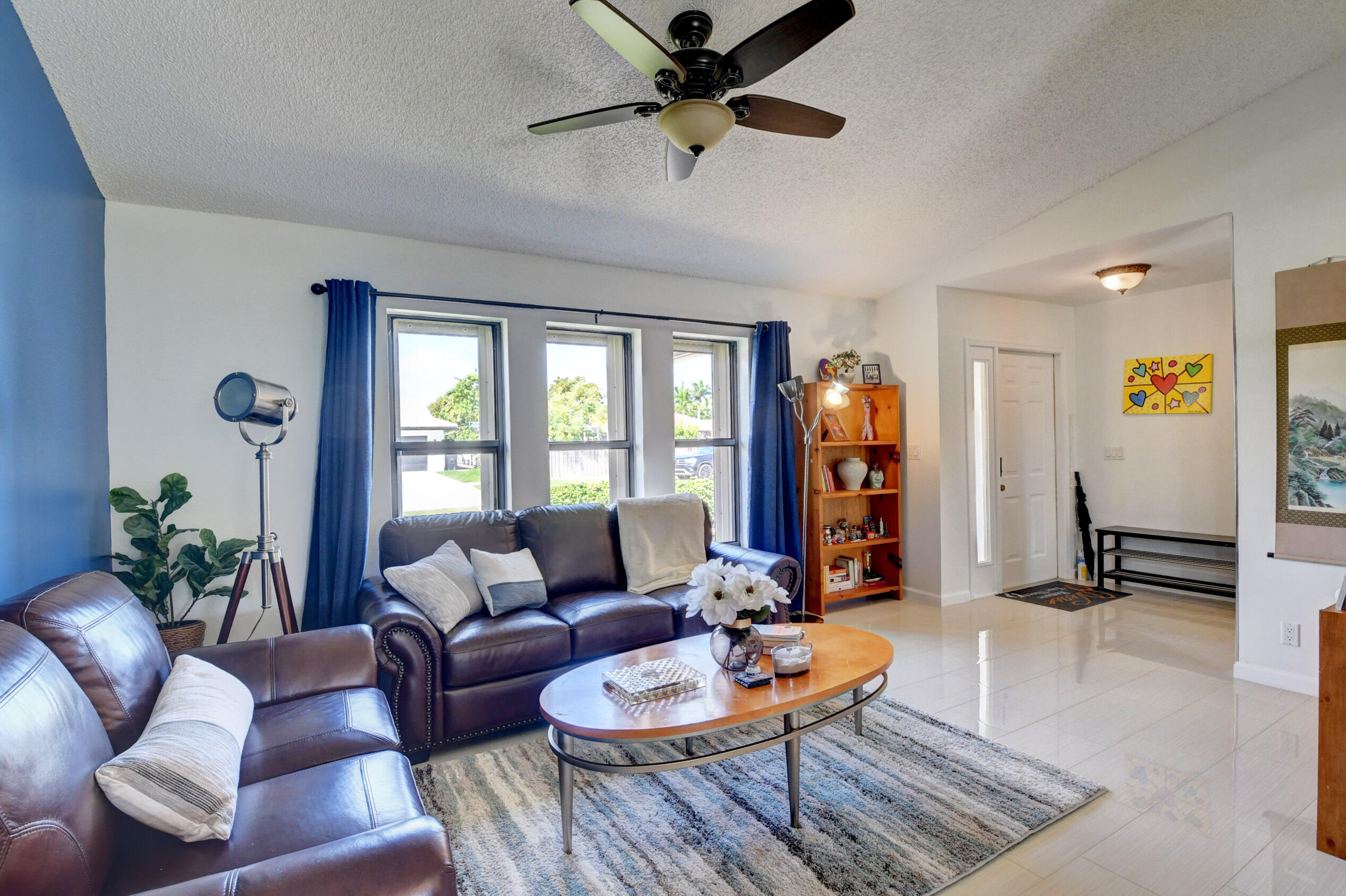 4192 Woods End Road Boca Raton, FL 33487 - Photo 11 of 63 a living room with furniture and a window