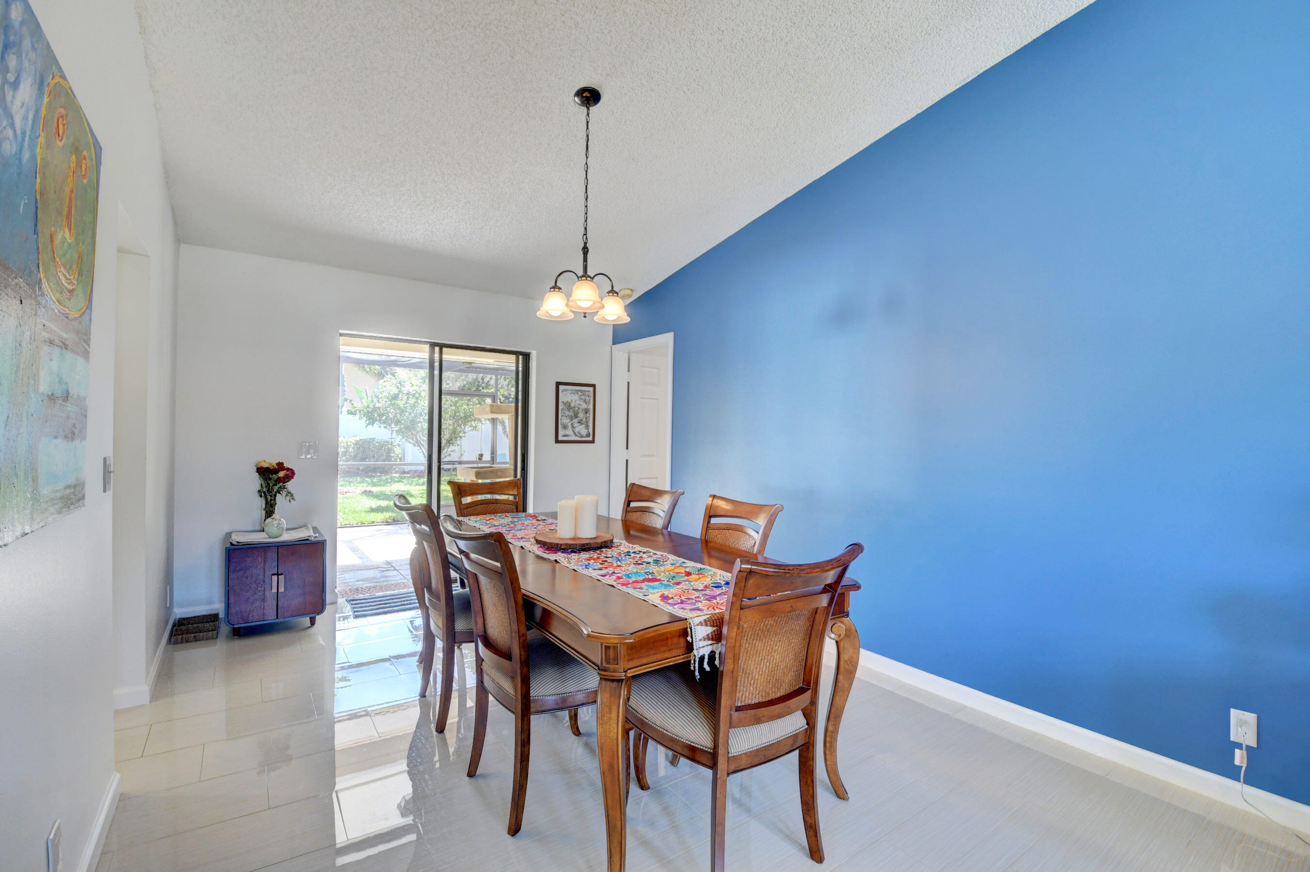 4192 Woods End Road Boca Raton, FL 33487 - Photo 12 of 63 a view of a dining room with furniture window and outside view