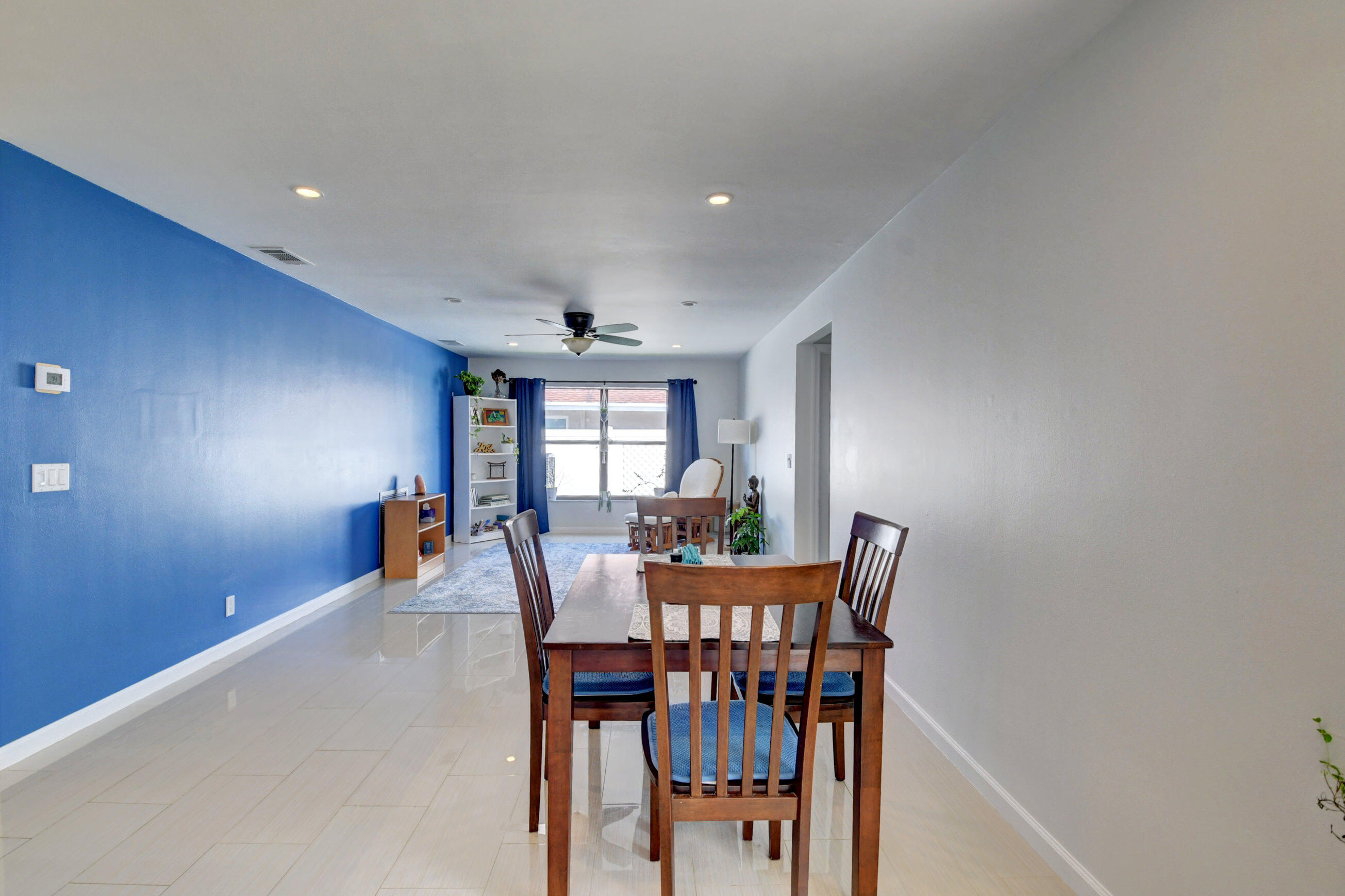 4192 Woods End Road Boca Raton, FL 33487 - Photo 20 of 63 a dining room with furniture and window
