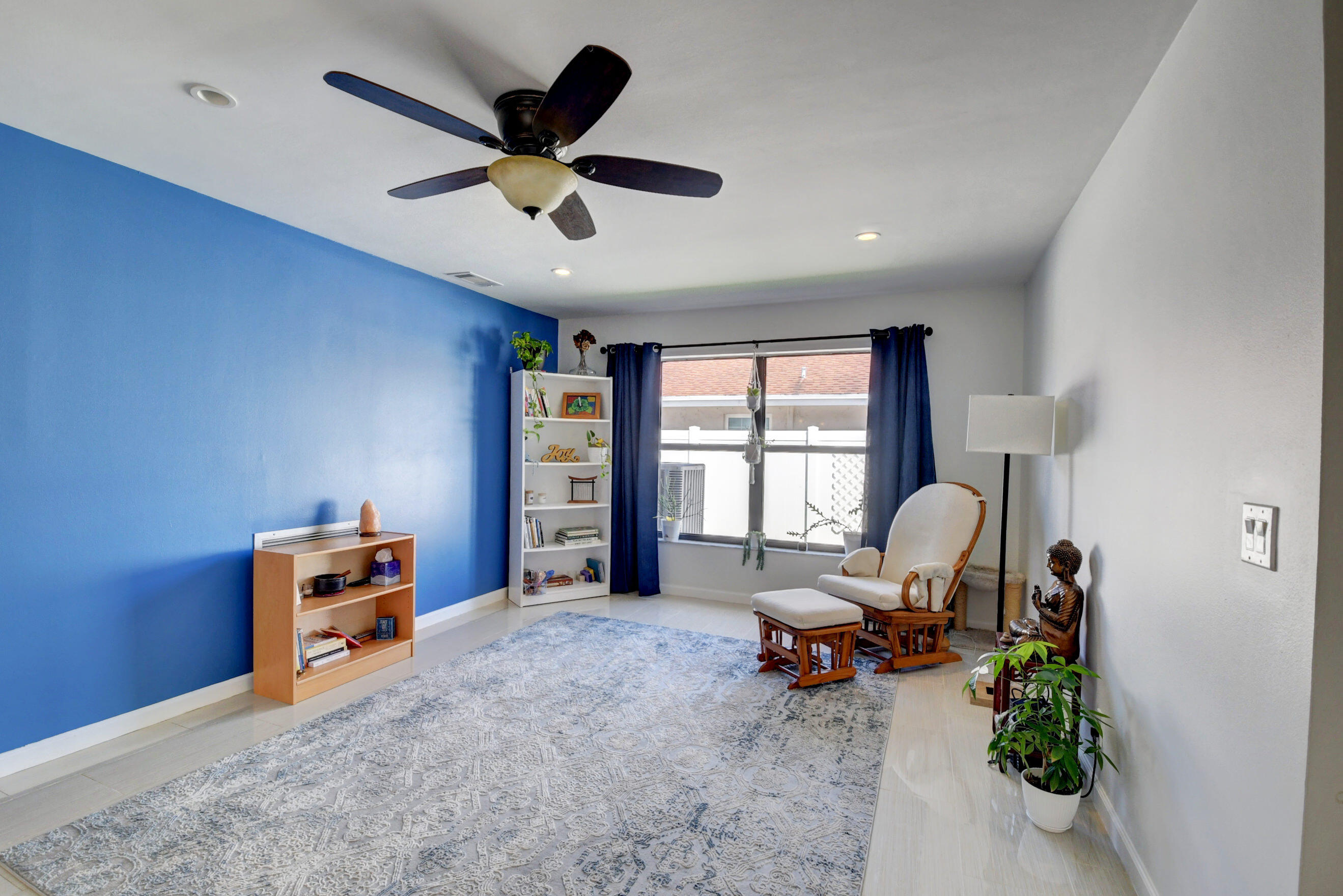 4192 Woods End Road Boca Raton, FL 33487 - Photo 23 of 63 a living room with furniture and a window