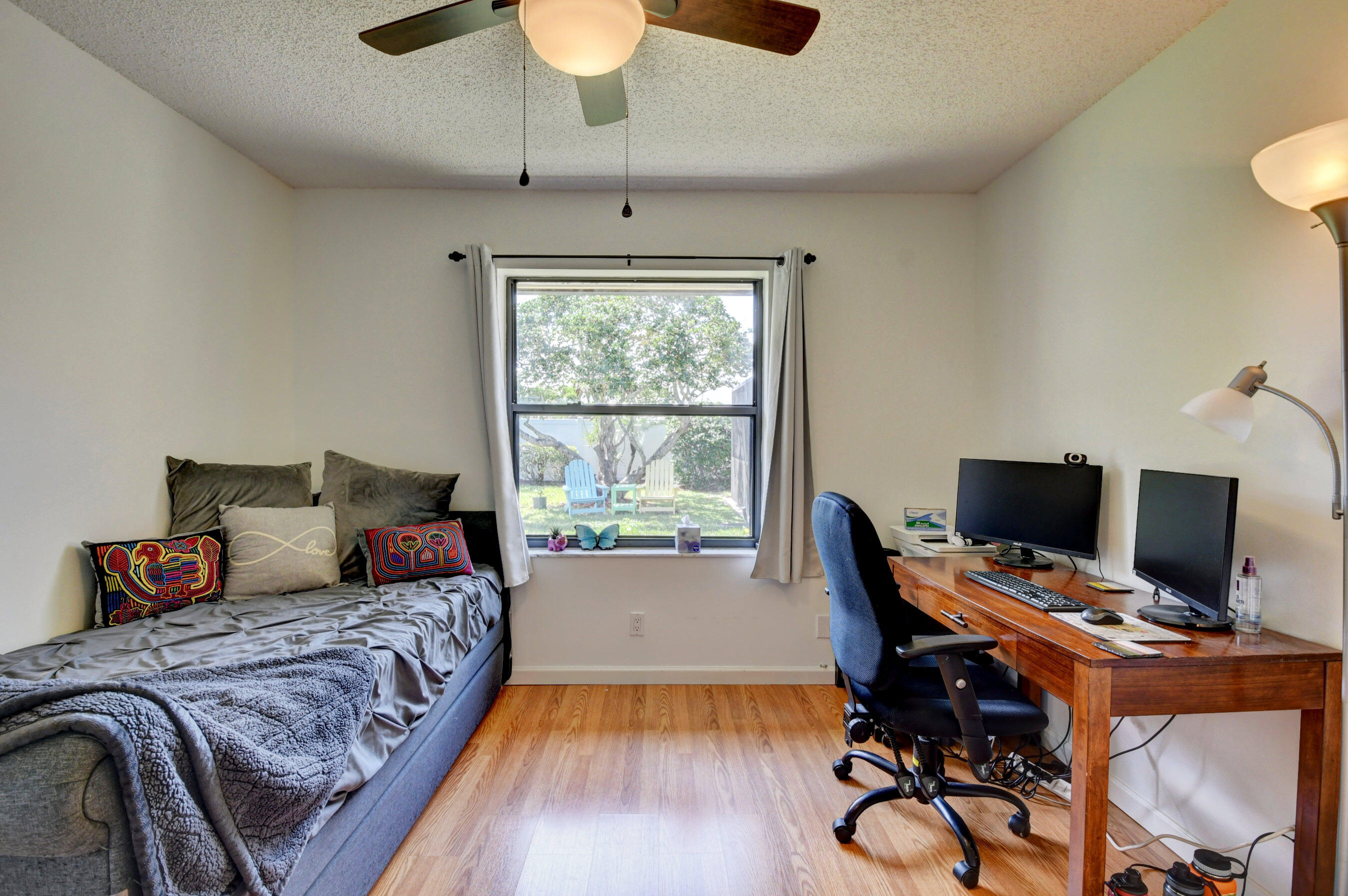 4192 Woods End Road Boca Raton, FL 33487 - Photo 29 of 63 a bedroom with a bed and a desk