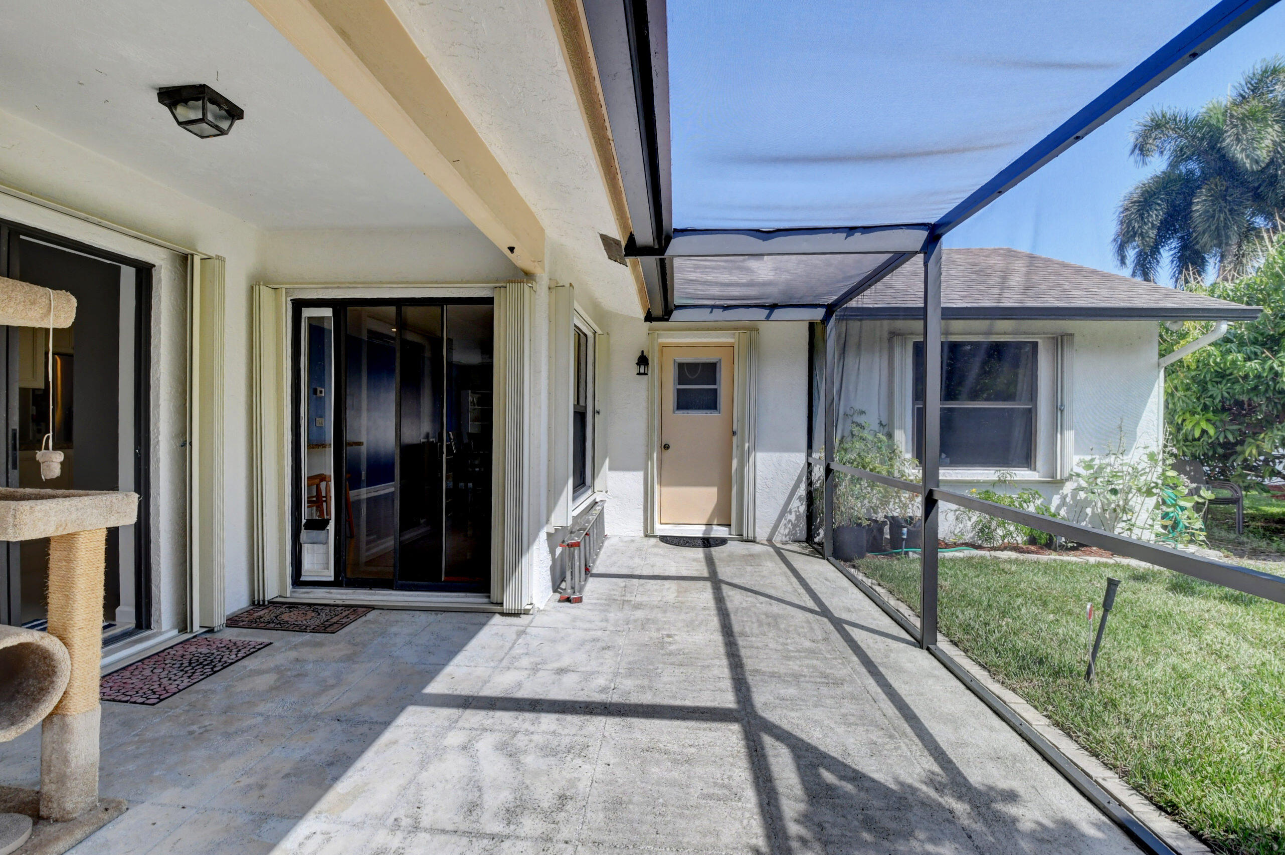4192 Woods End Road Boca Raton, FL 33487 - Photo 39 of 63 a front view of a house with a porch