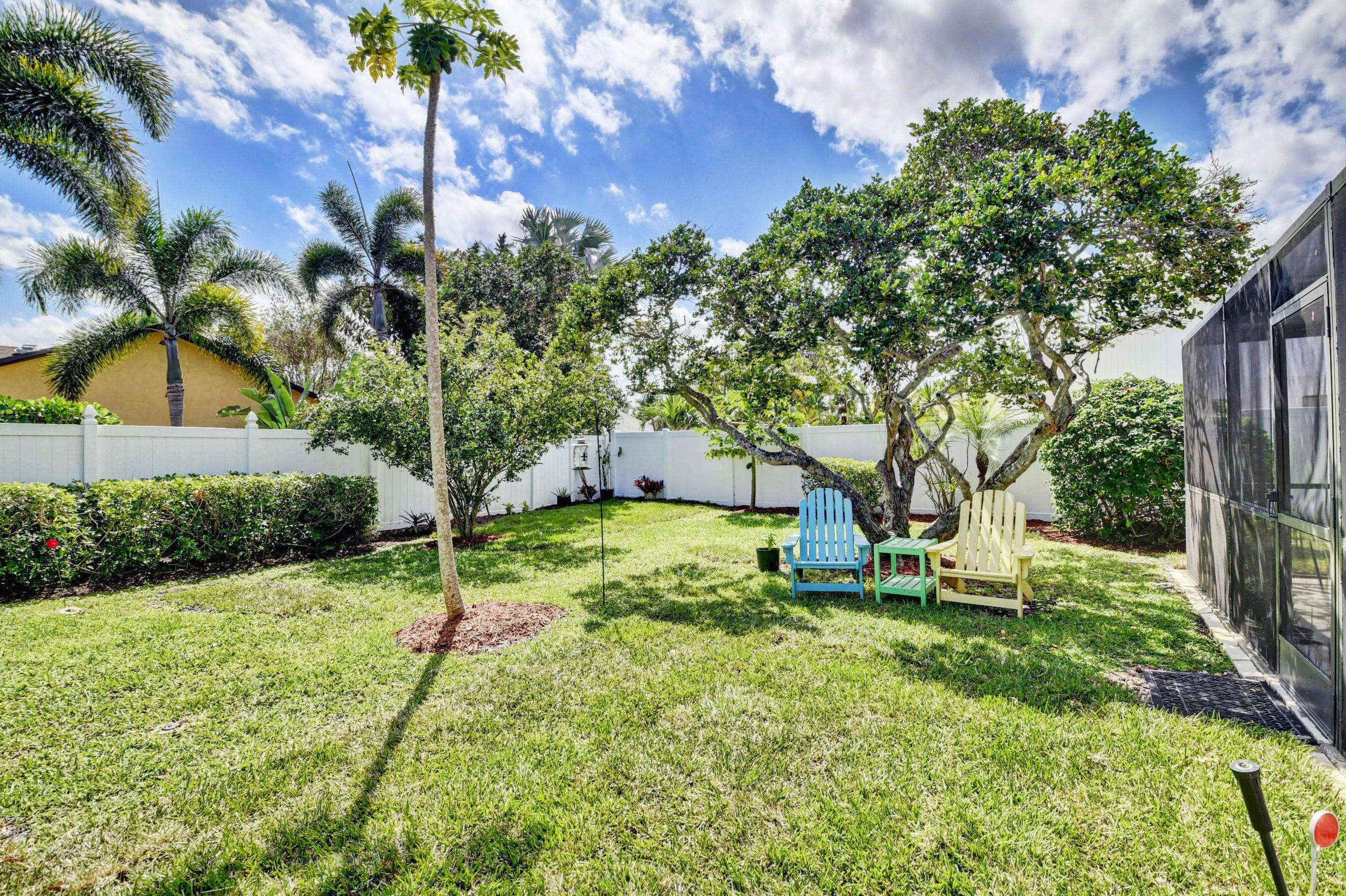 4192 Woods End Road Boca Raton, FL 33487 - Photo 50 of 63 a view of backyard with a garden and entertaining space