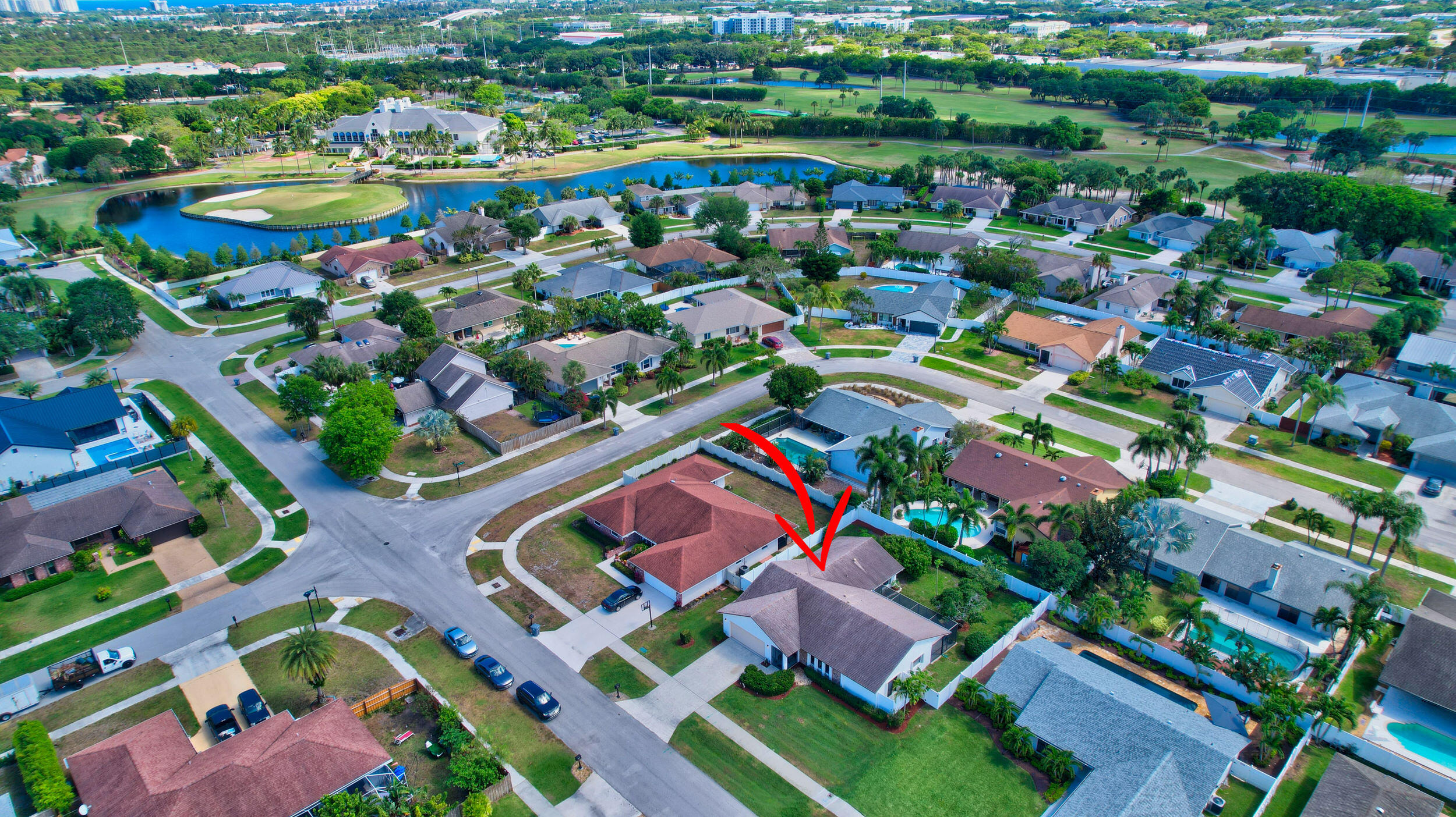 4192 Woods End Road Boca Raton, FL 33487 - Photo 55 of 63 an aerial view of residential houses with outdoor space and swimming pool