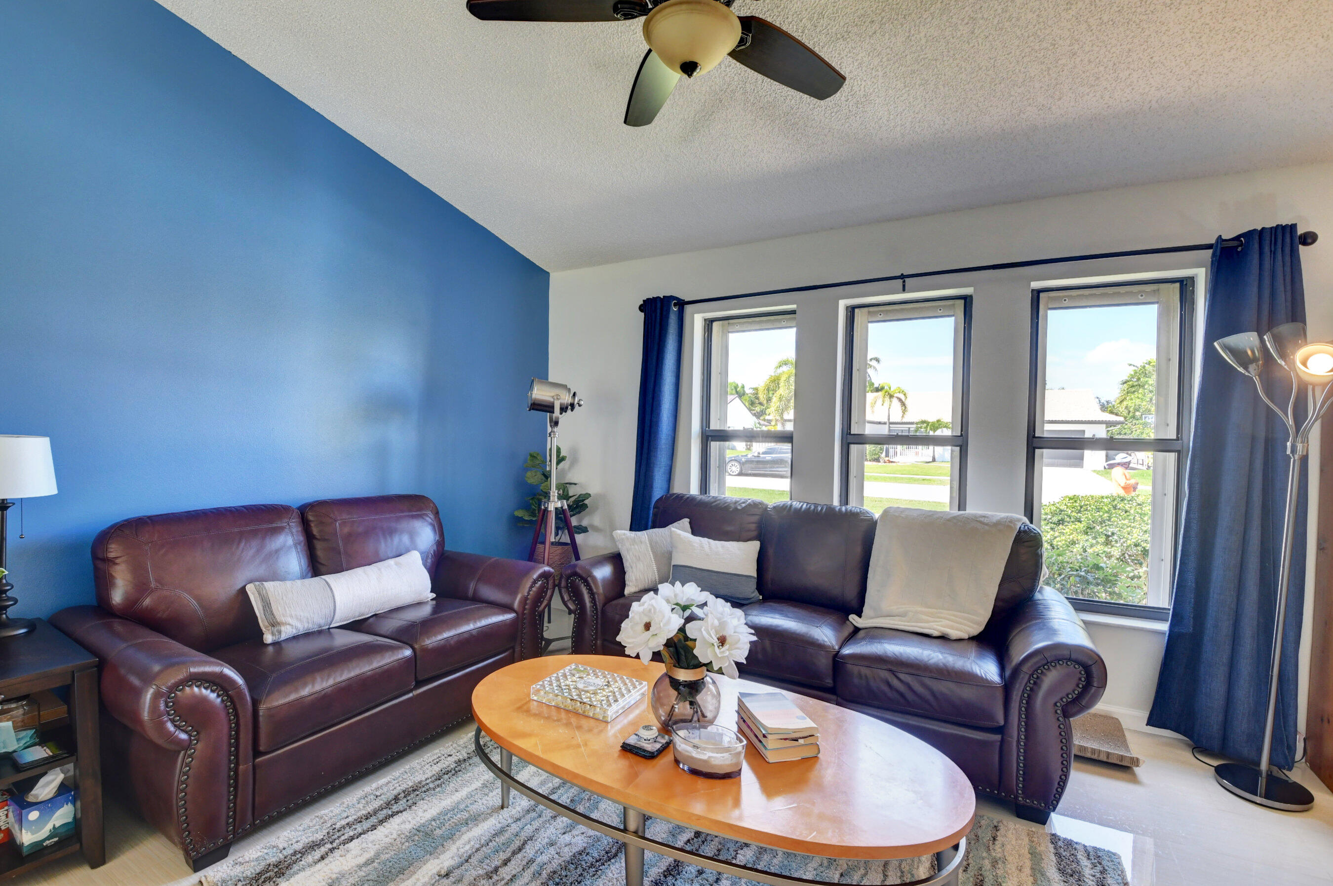 4192 Woods End Road Boca Raton, FL 33487 - Photo 10 of 63 a living room with furniture and a window
