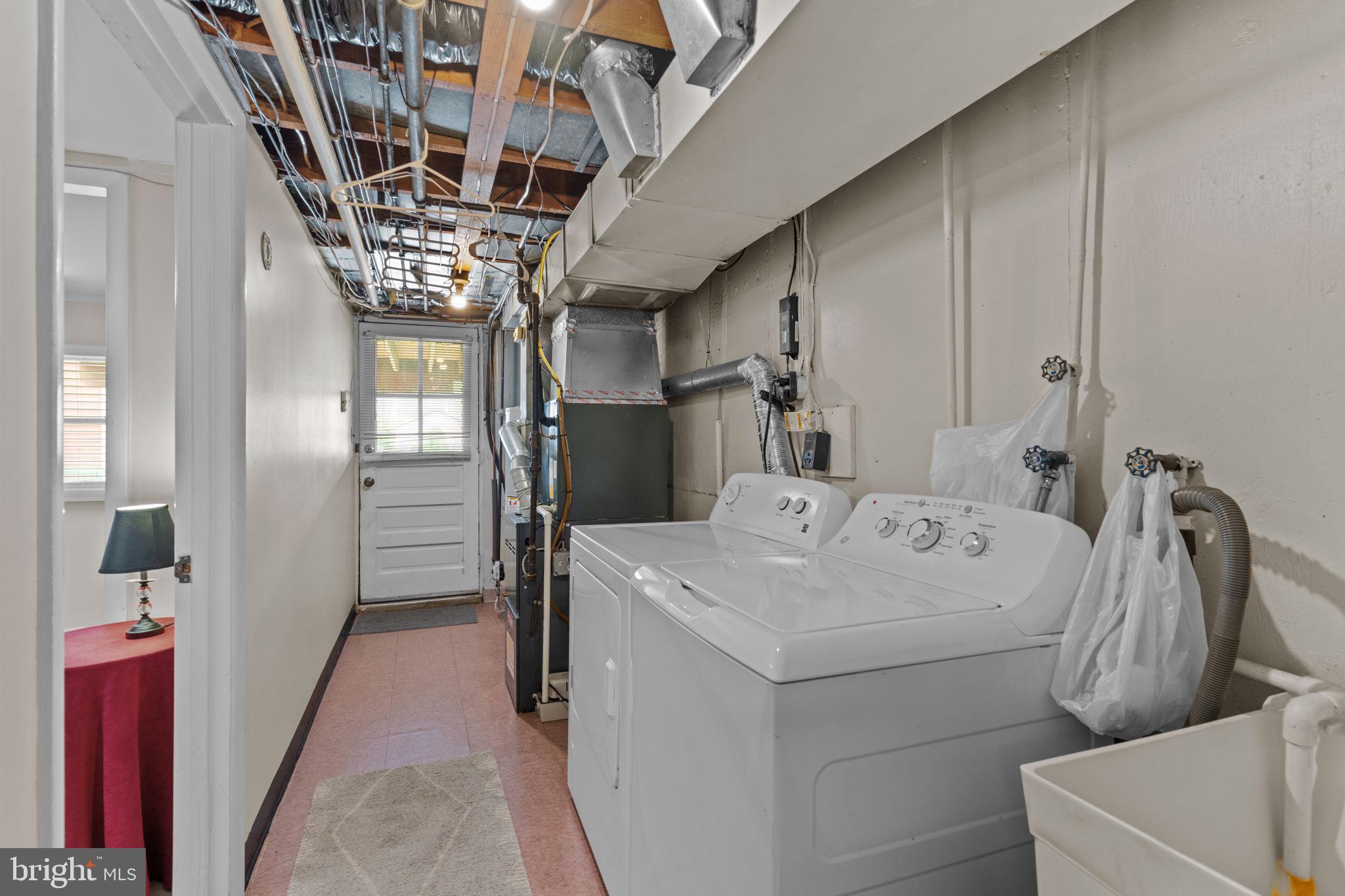 233 Lynn Road Ridley Park, PA 19078 - Photo 25 of 35 laundry room, access to driveway