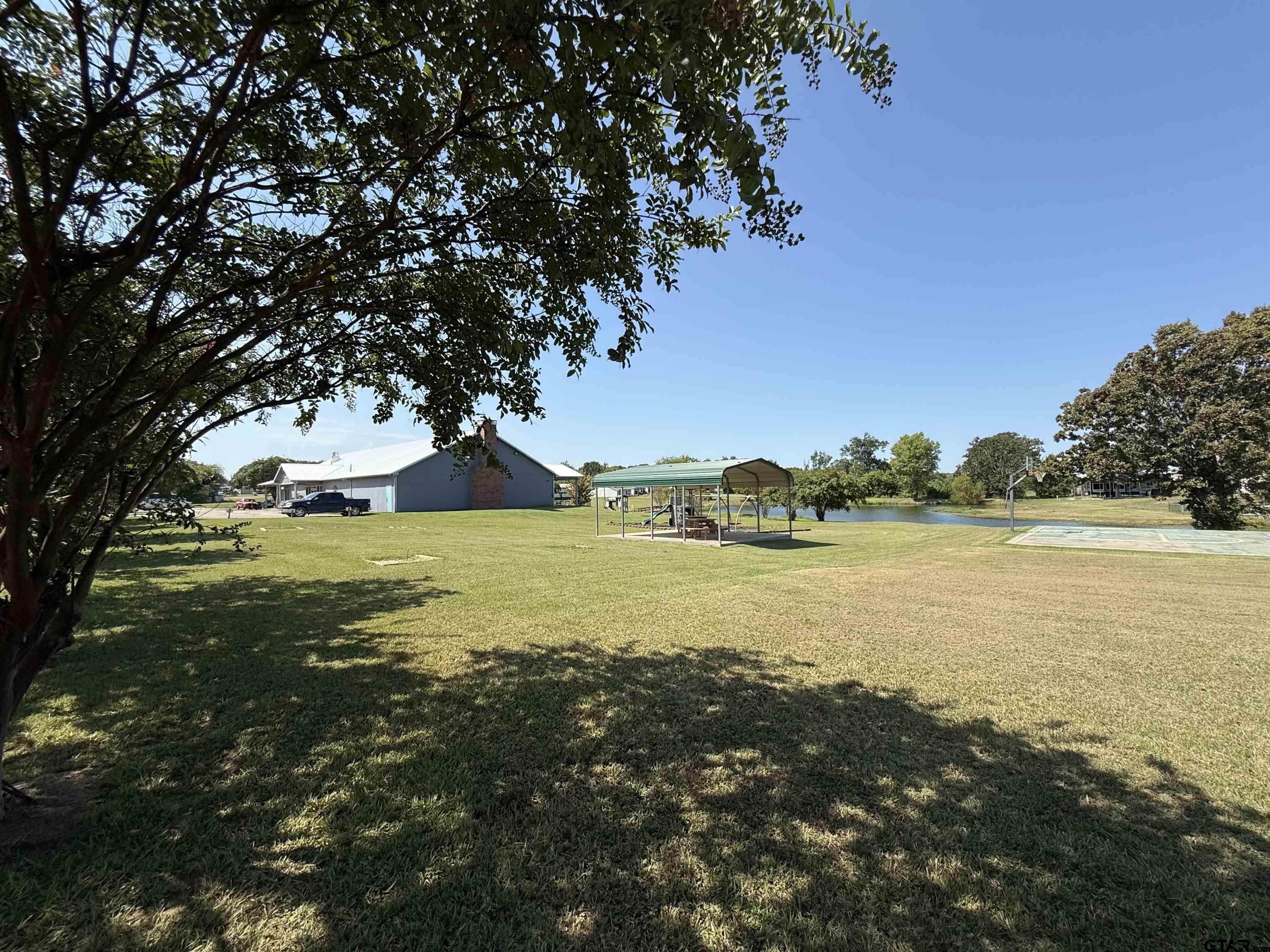 0 Waterfront Row, Unit 213 Quitman, TX 75783 - Photo 12 of 24 a view of an ocean and beach