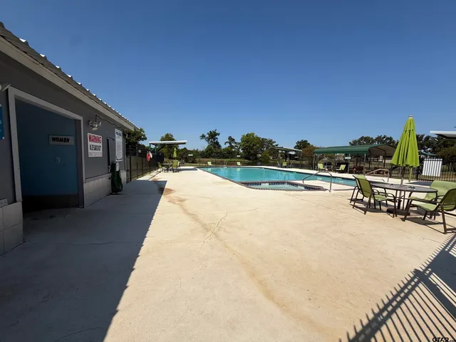 a view of a yard with an outdoor space