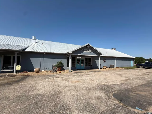 a view of a terrace with yard