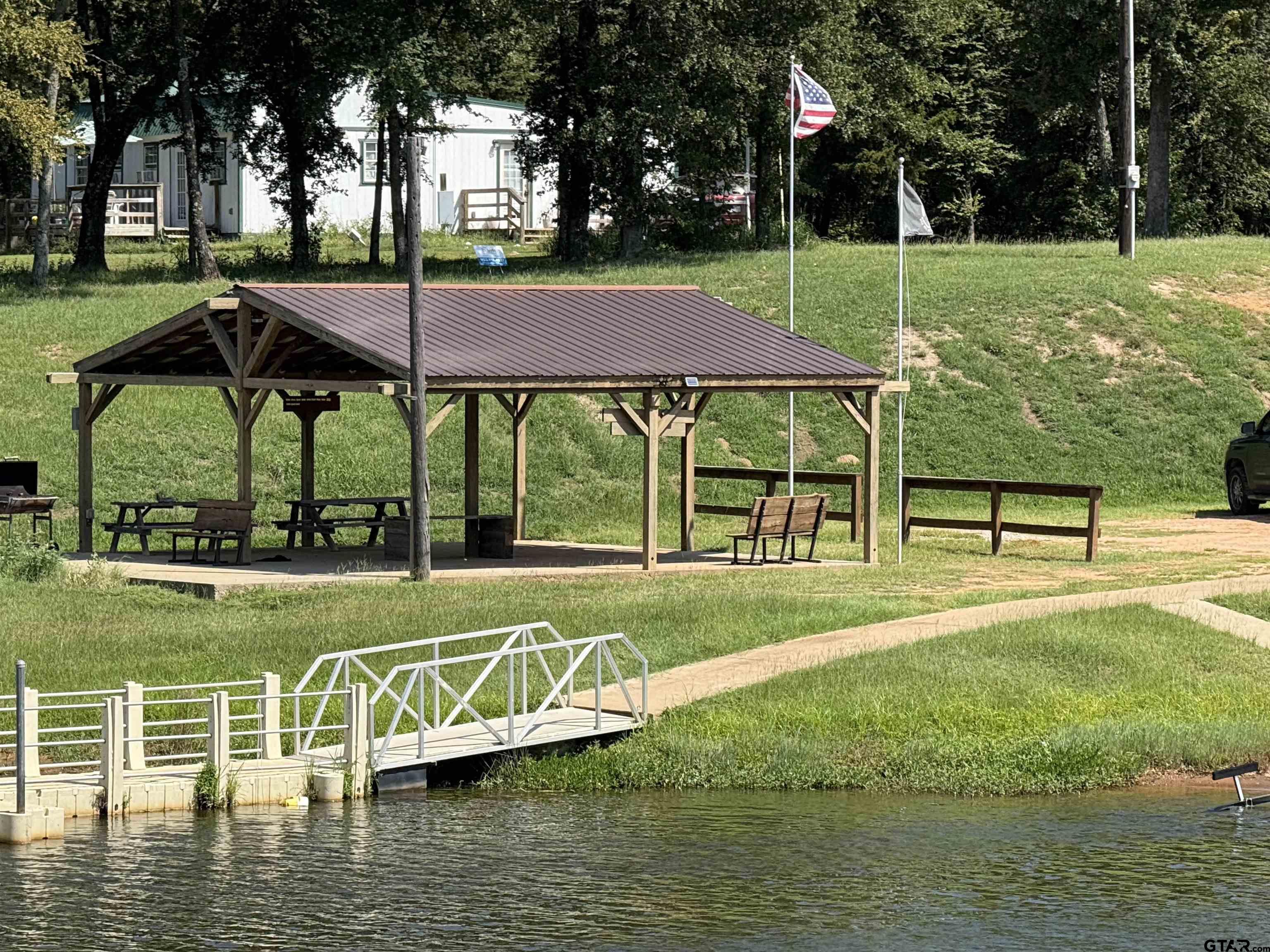 0 Waterfront Row, Unit 213 Quitman, TX 75783 - Photo 9 of 24 a view of a house with a yard