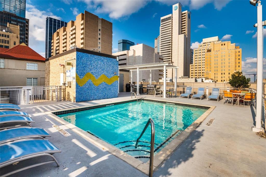 1122 Jackson Street, Unit 521 Dallas, TX 75202 - Photo 10 of 12 an aerial view of a swimming pool with outdoor seating