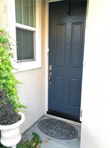 a kitchen with stainless steel appliances granite countertop a stove and a refrigerator