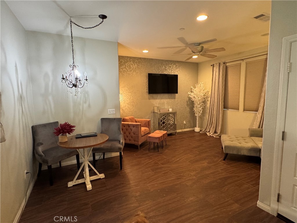 41299 St Croix Temecula, CA 92591 - Photo 7 of 17 a living room with furniture and a wooden floor