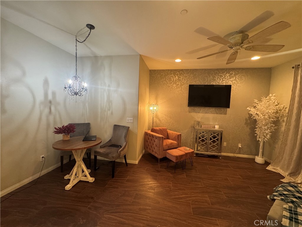41299 St Croix Temecula, CA 92591 - Photo 9 of 17 a living room with furniture and a flat screen tv