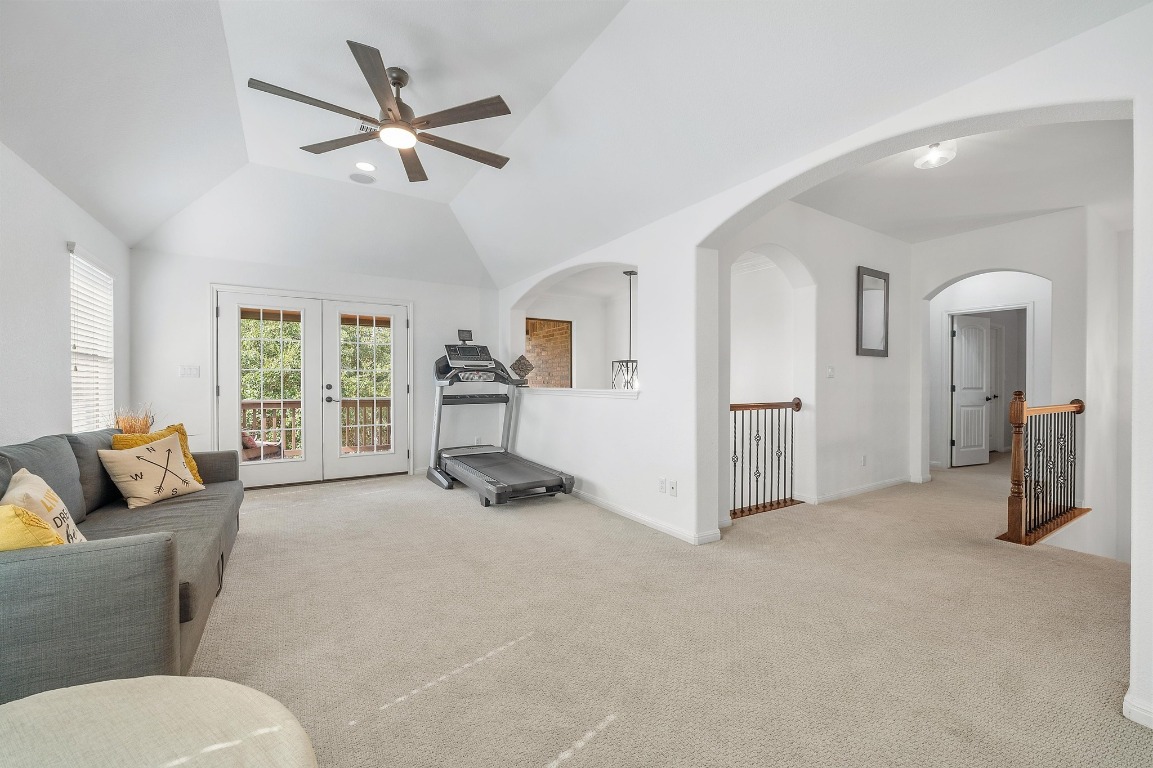 12404 Mediterra Place Austin, TX 78732 - Photo 24 of 39 a living room with furniture and a window