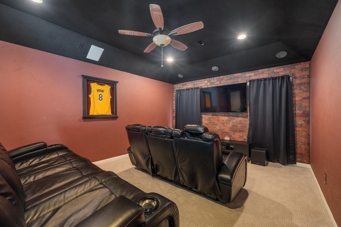 12404 Mediterra Place Austin, TX 78732 - Photo 27 of 39 a bed room with a bed and a television