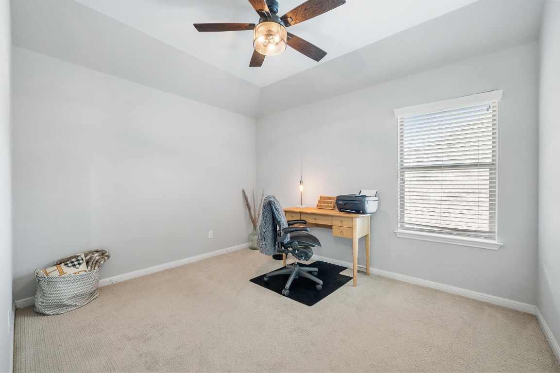 12404 Mediterra Place Austin, TX 78732 - Photo 31 of 39 a workspace with furniture and window