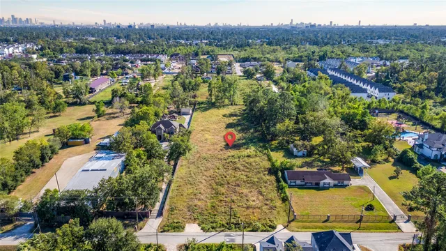 an aerial view of residential house and outdoor space