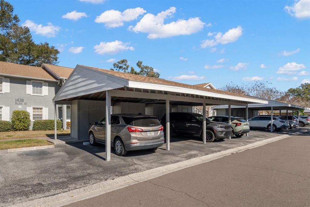 1438 Millstream Lane, Unit 203 Dunedin, FL 34698 - Photo 31 of 60 a view of a car garage