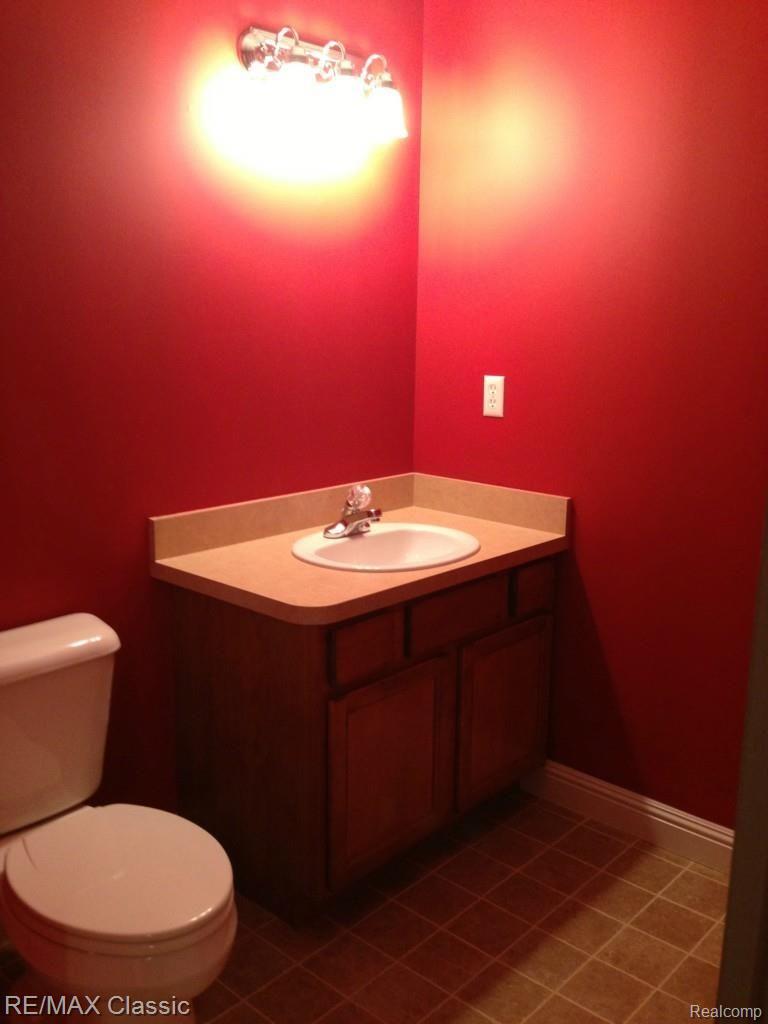41484 Glade Road, Unit 57 Canton, MI 48187 - Photo 22 of 25 BASEMENT HALF BATH ALREADY THERE FOR YOU