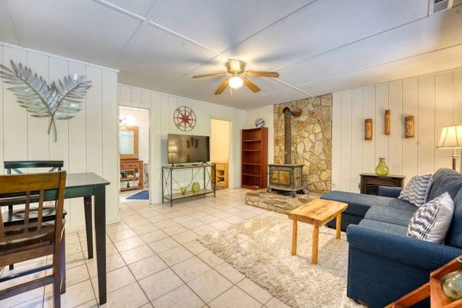 3333 Ellington Road Hayesville, NC 28904 - Photo 48 of 56 a living room with furniture a dining table and a piano