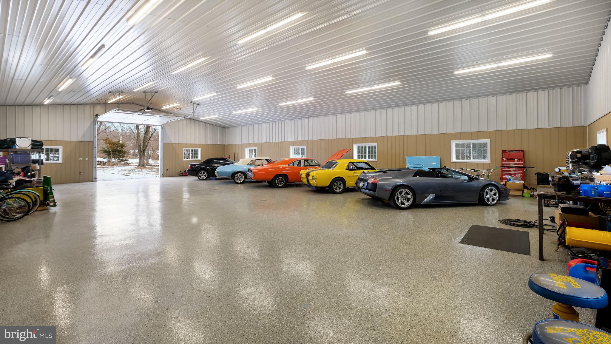1732 Creek Road New Hope, PA 18938 - Photo 19 of 52 a room with lots of cars parked on the wall