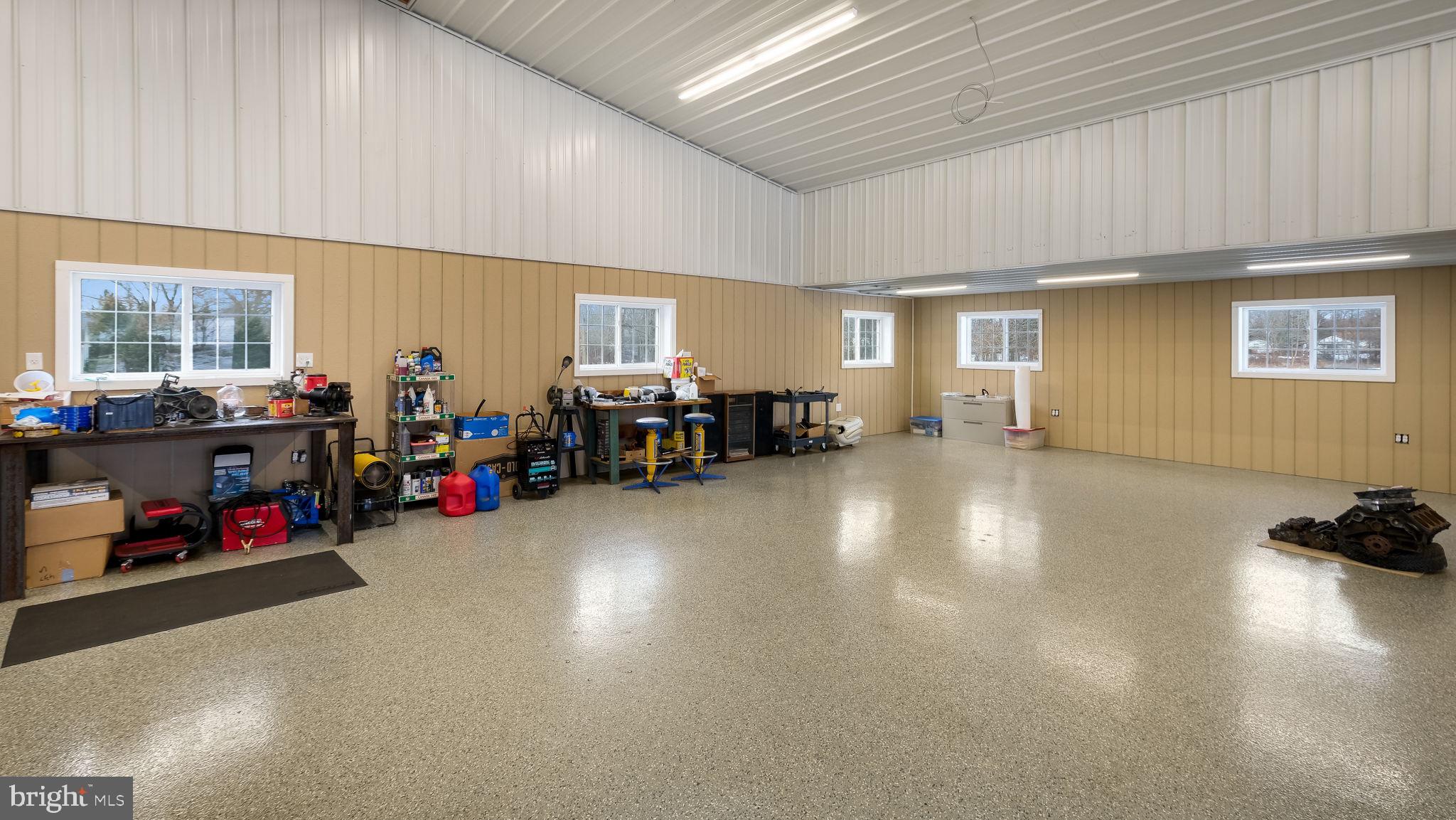 1732 Creek Road New Hope, PA 18938 - Photo 26 of 52 a living room with furniture a window and gym equipment
