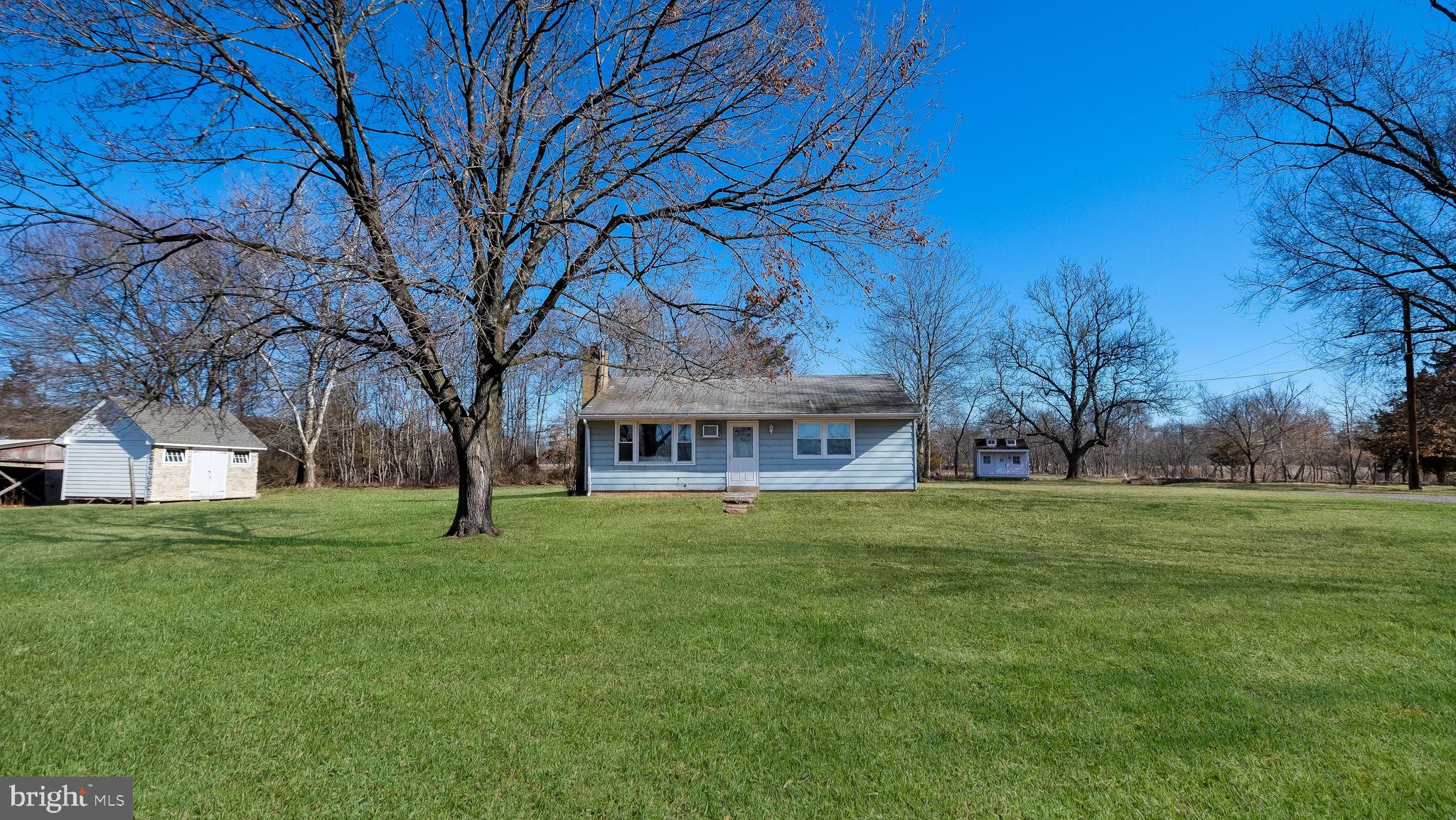 1732 Creek Road New Hope, PA 18938 - Photo 3 of 52 a view of a big yard next to a house