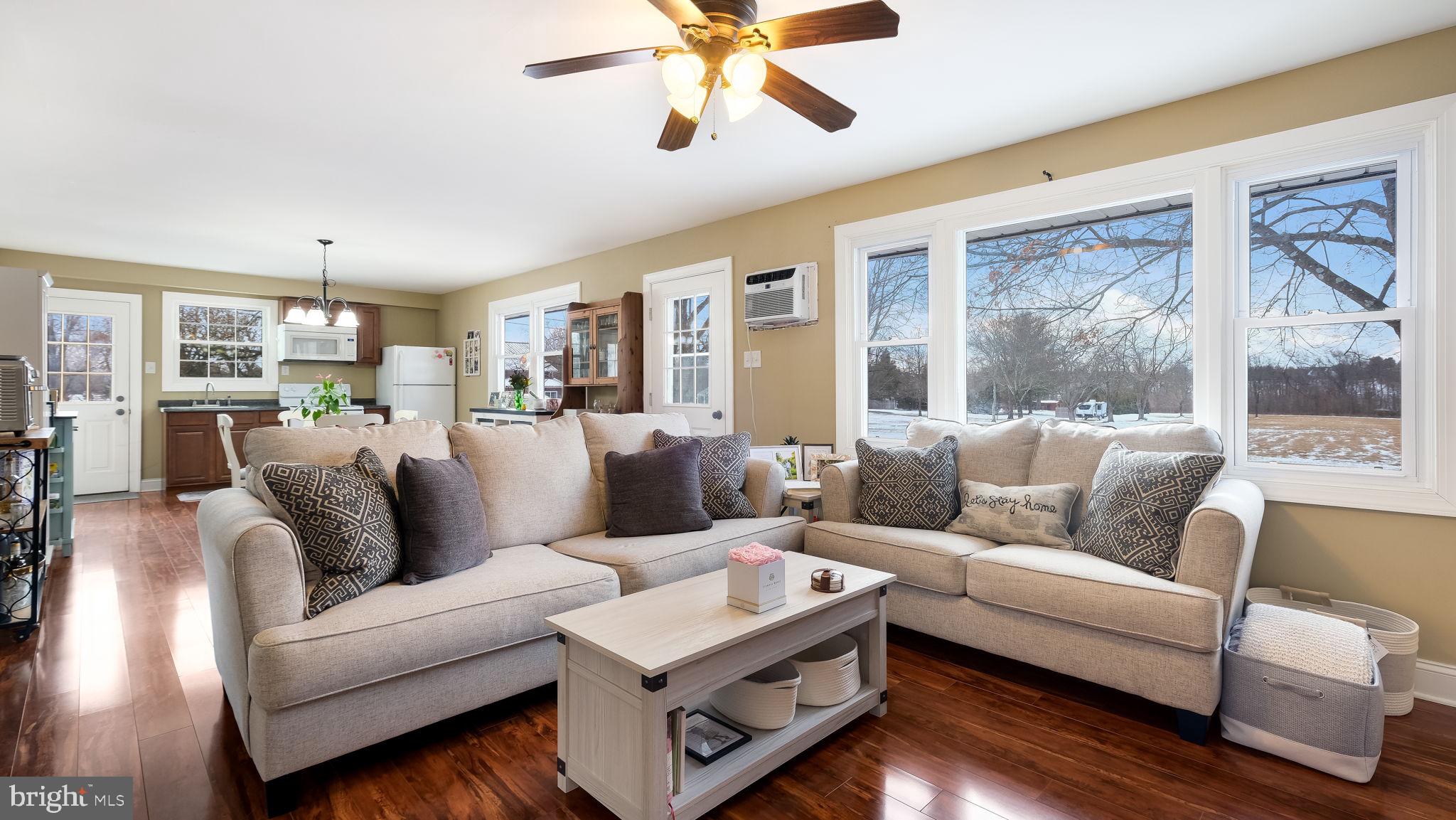 1732 Creek Road New Hope, PA 18938 - Photo 37 of 52 a living room with furniture and a large window