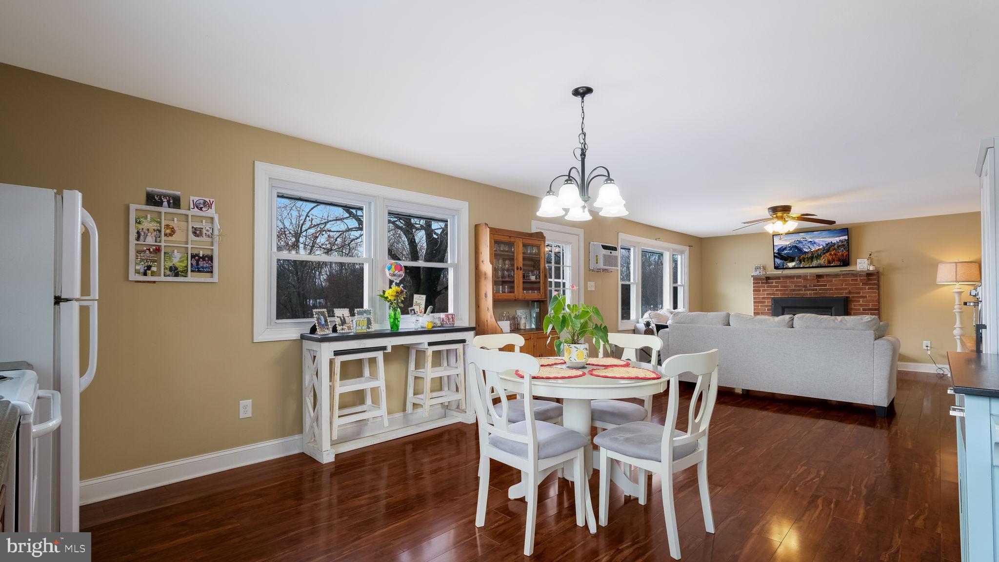 1732 Creek Road New Hope, PA 18938 - Photo 40 of 52 a view of a dining room with furniture window and wooden floor