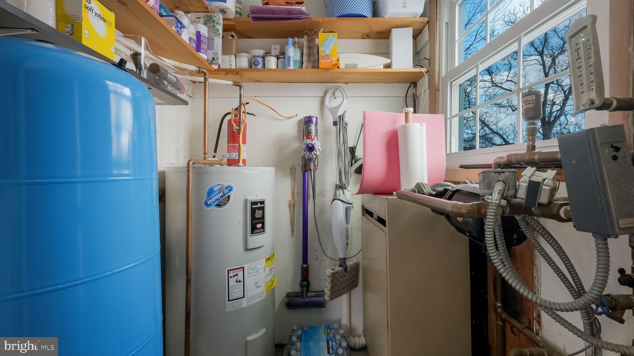 1732 Creek Road New Hope, PA 18938 - Photo 44 of 52 a view of walk in closet with clothes and shoes