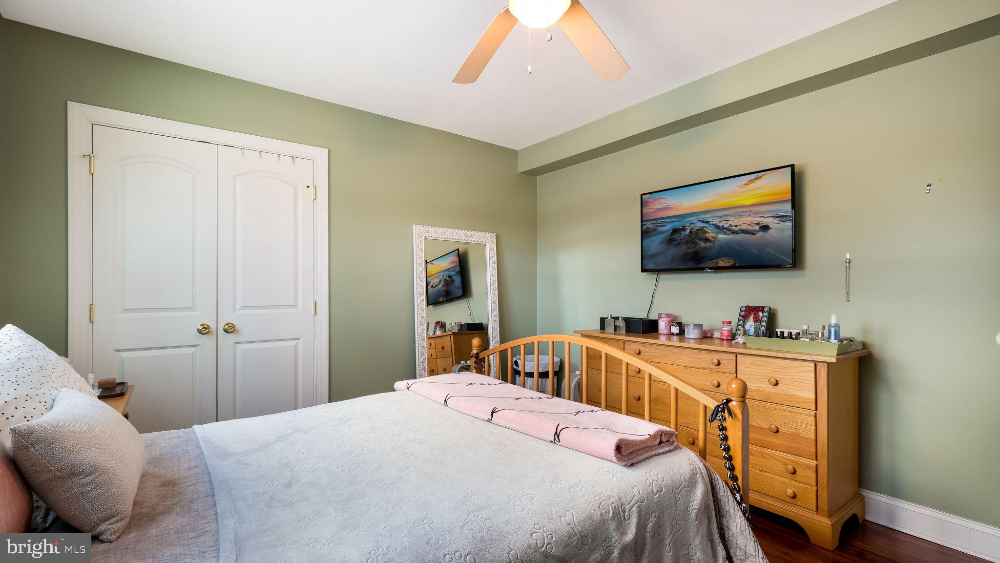 1732 Creek Road New Hope, PA 18938 - Photo 48 of 52 a bedroom with a bed and a flat screen tv