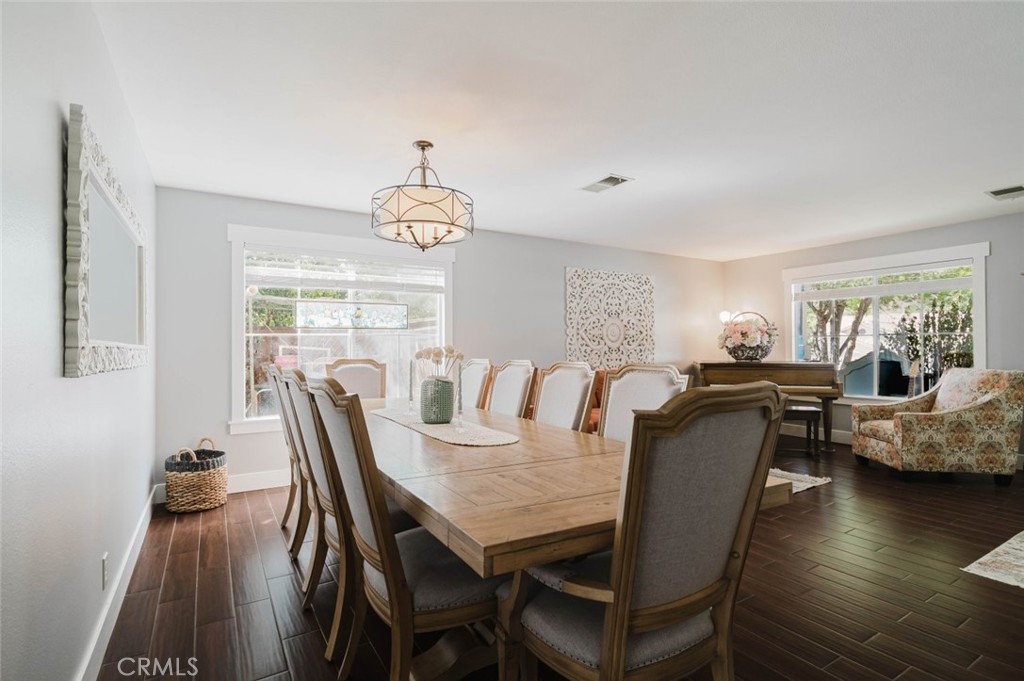 32480 The Old Road Castaic, CA 91384 - Photo 11 of 68 a view of a dining room with furniture and wooden floor