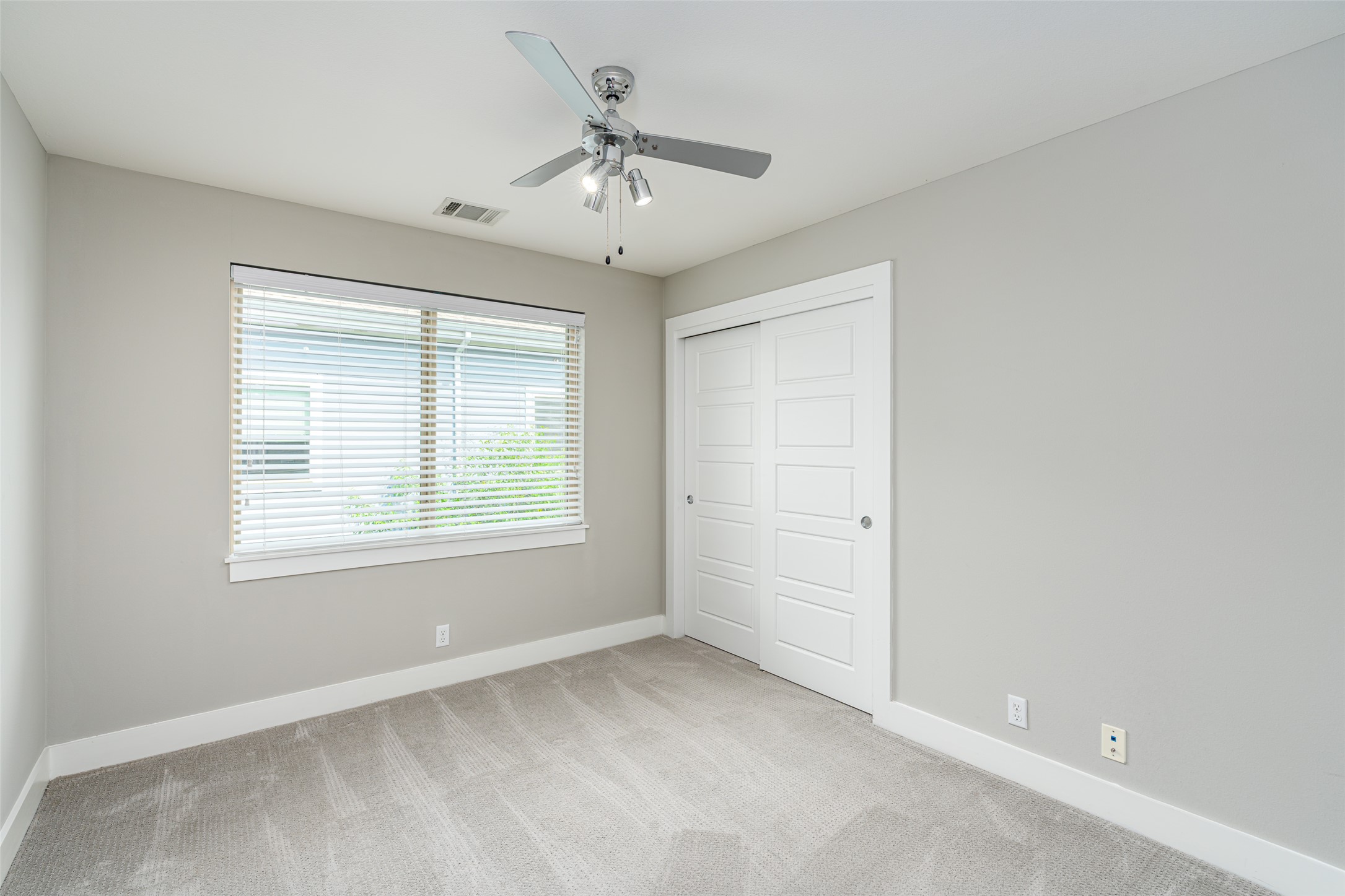 705 East 49th Street, Unit A Austin, TX 78751 - Photo 27 of 40 a view of an empty room with a window