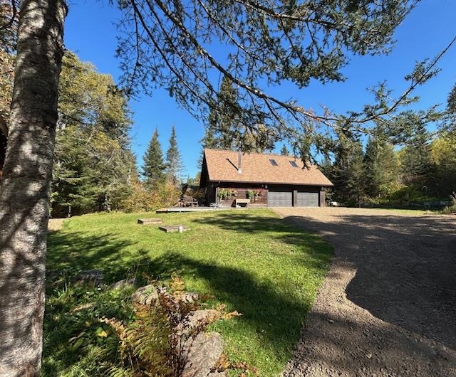 85 Caps Trail Lutsen, MN 55612 - Photo 17 of 94 View of Guest Cabin from House