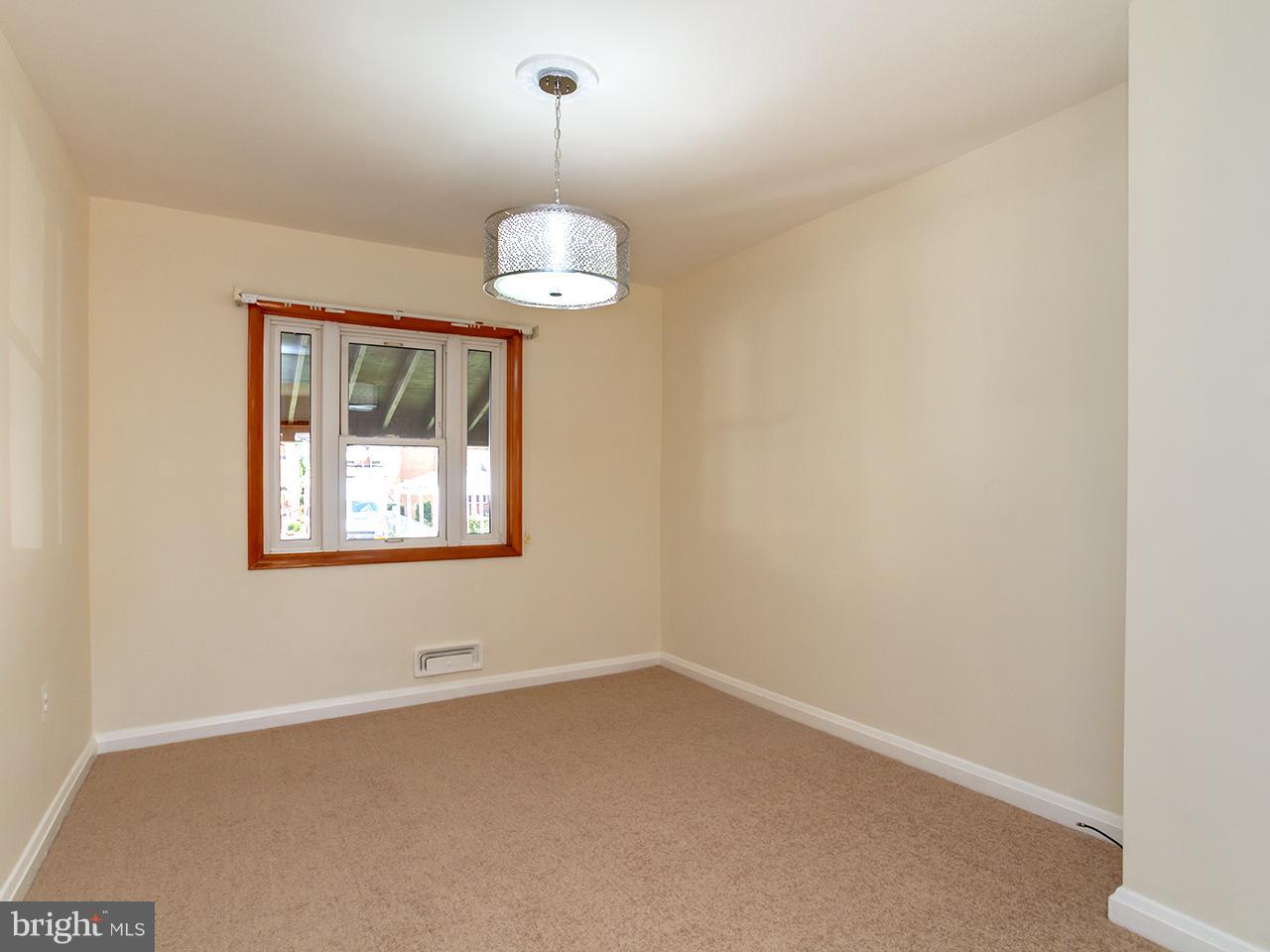 1949 Wareham Road Baltimore, MD 21222 - Photo 6 of 30 Dining Room with Hardwood Floors Under New Carpet