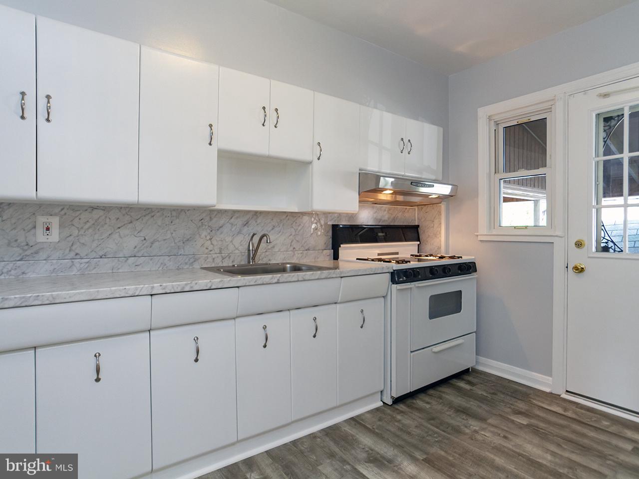 1949 Wareham Road Baltimore, MD 21222 - Photo 9 of 30 Kitchen with fresh paint and new backsplash