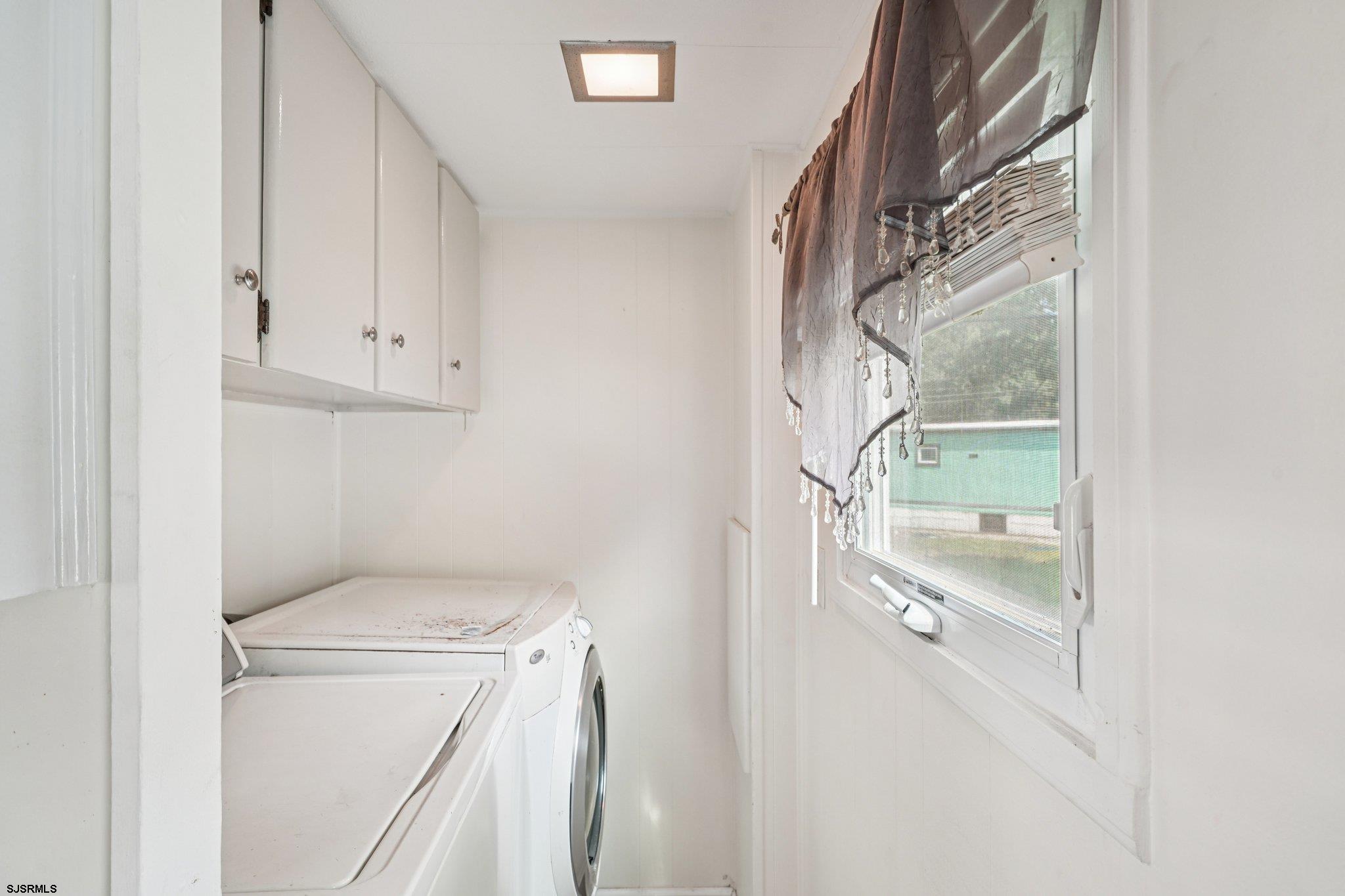 2528 Tilton Road Egg Harbor Township, NJ 08234 - Photo 17 of 31 a utility room with dryer and washer