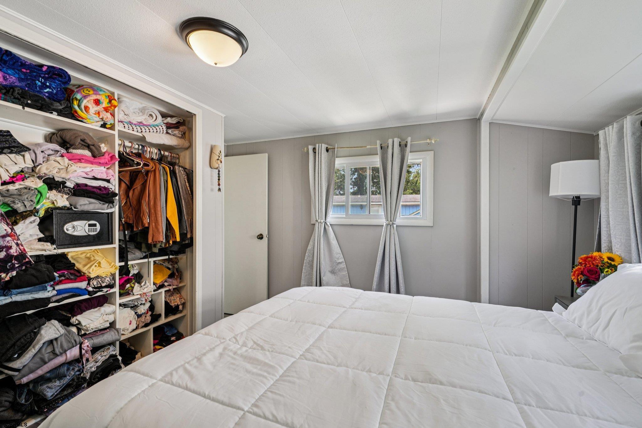 2528 Tilton Road Egg Harbor Township, NJ 08234 - Photo 21 of 31 a bedroom with a bed and a window