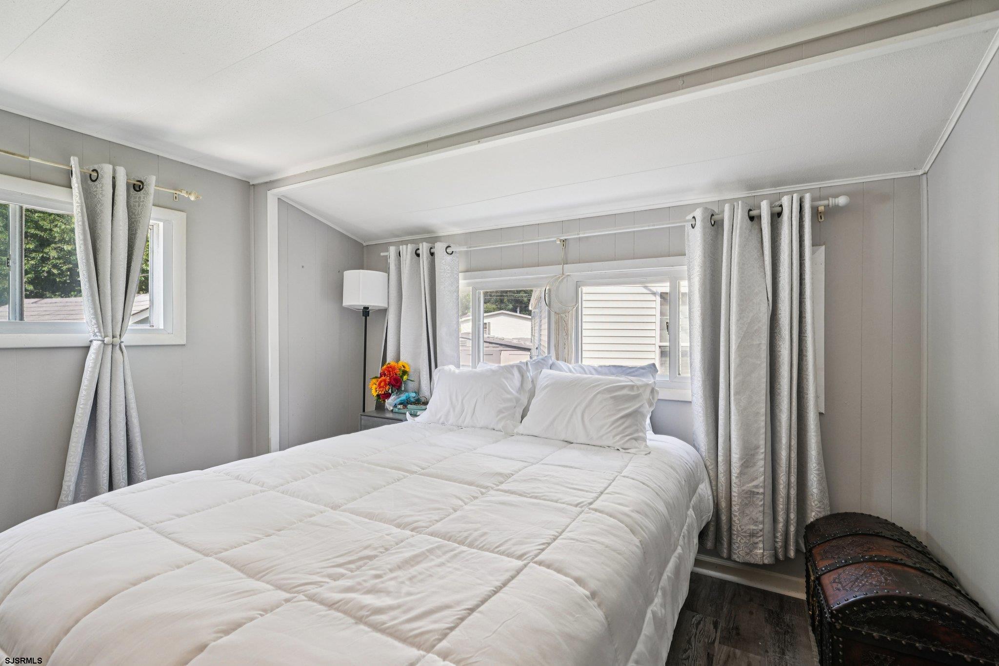 2528 Tilton Road Egg Harbor Township, NJ 08234 - Photo 22 of 31 a bedroom with a bed and a window