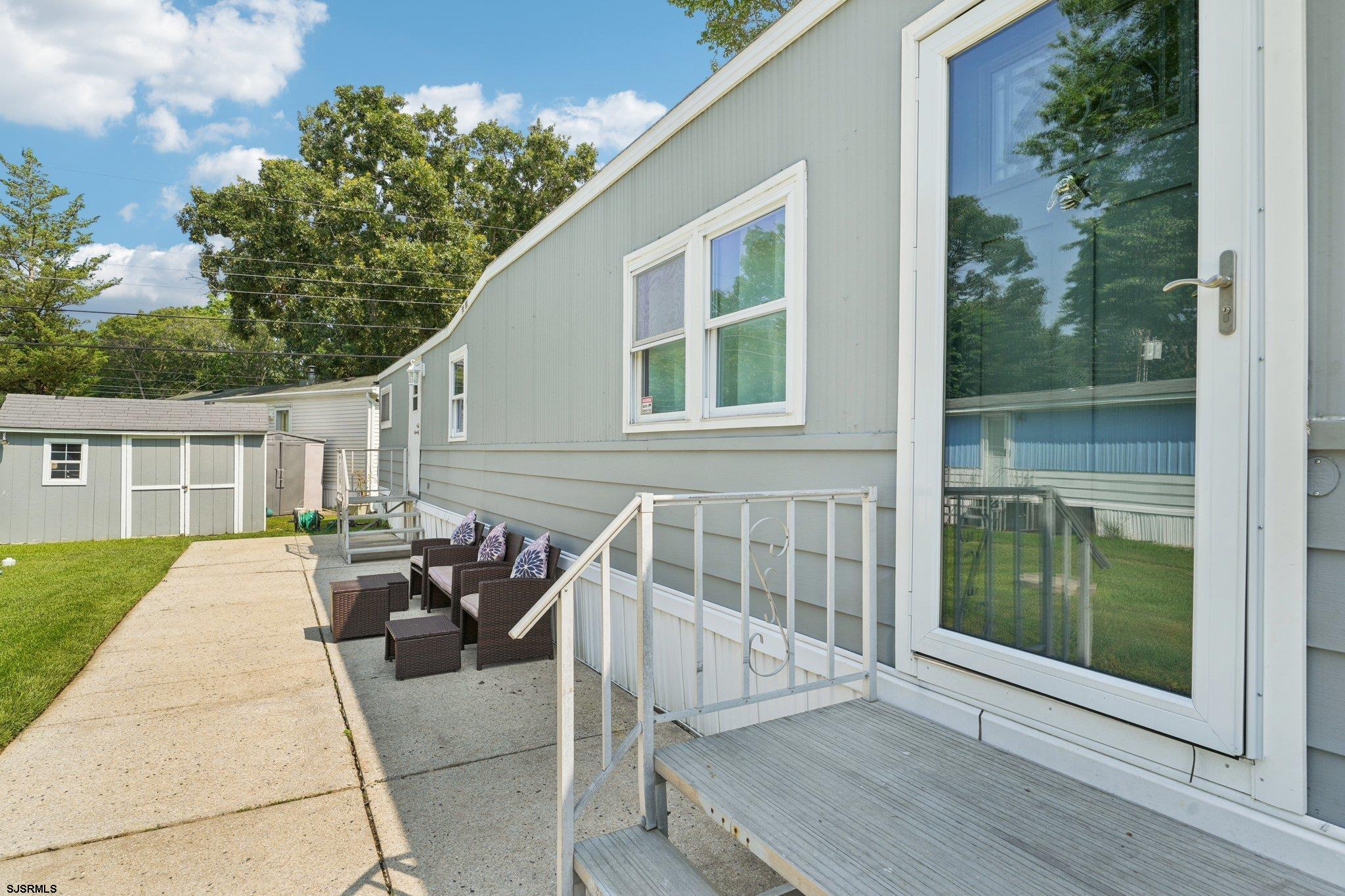 2528 Tilton Road Egg Harbor Township, NJ 08234 - Photo 5 of 31 a view of house with backyard and sitting area