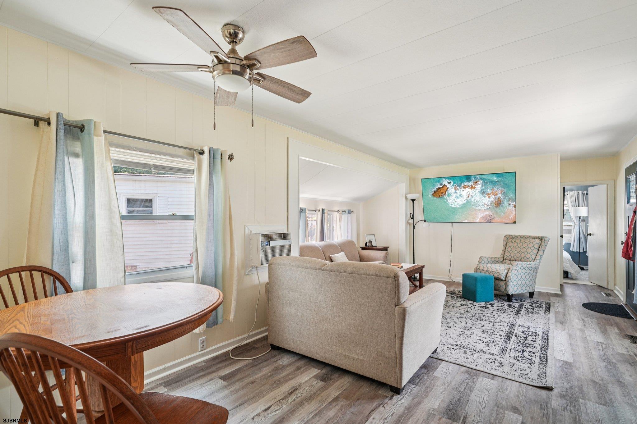 2528 Tilton Road Egg Harbor Township, NJ 08234 - Photo 6 of 31 a living room with furniture and a table