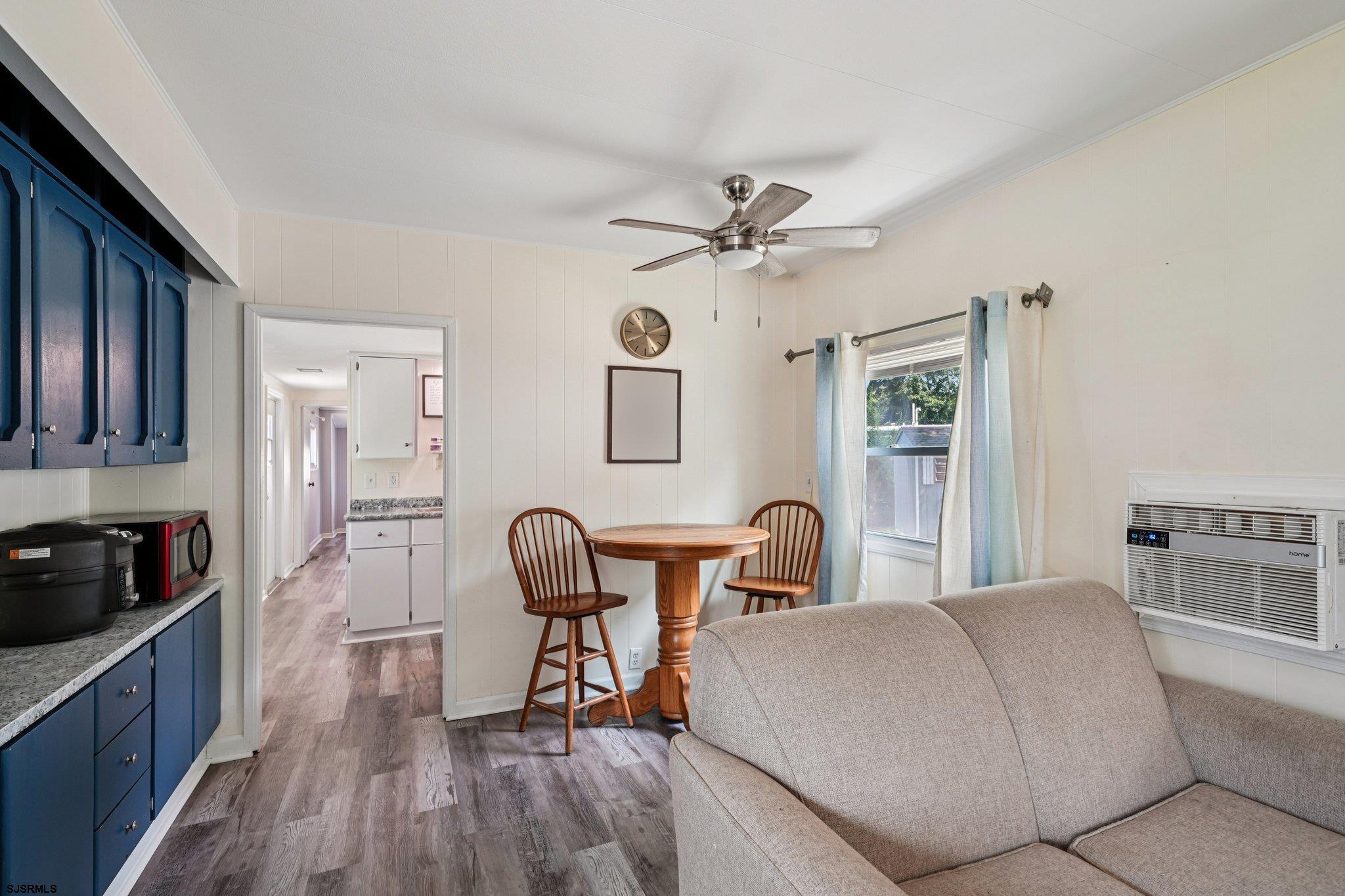 2528 Tilton Road Egg Harbor Township, NJ 08234 - Photo 7 of 31 a living room with furniture and wooden floor