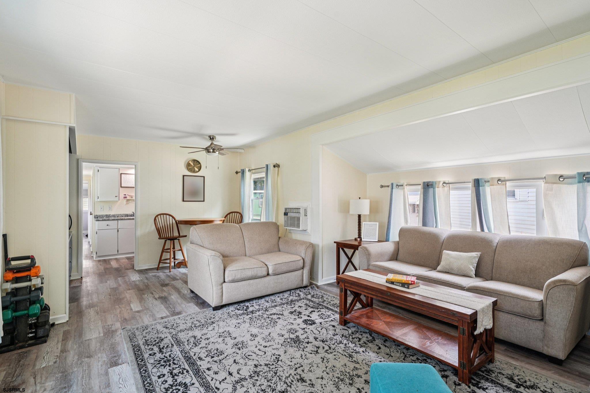 2528 Tilton Road Egg Harbor Township, NJ 08234 - Photo 10 of 31 a living room with furniture and a couch