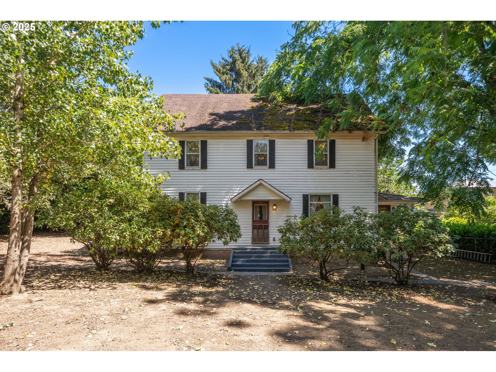 12040 Southeast Revenue Road Boring, OR 97009 - Photo 1 of 46 a front view of a house with a yard