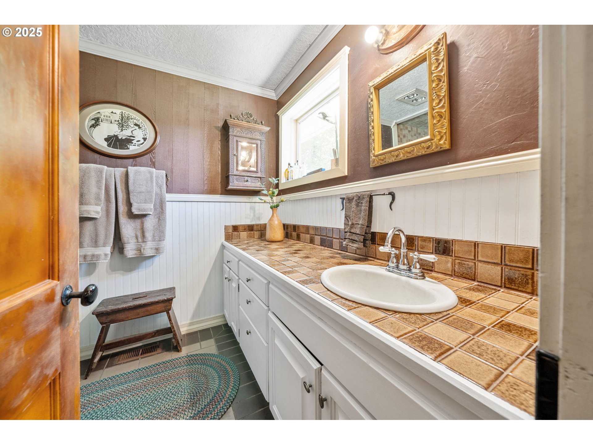 12040 Southeast Revenue Road Boring, OR 97009 - Photo 14 of 46 a bathroom with a sink and a mirror