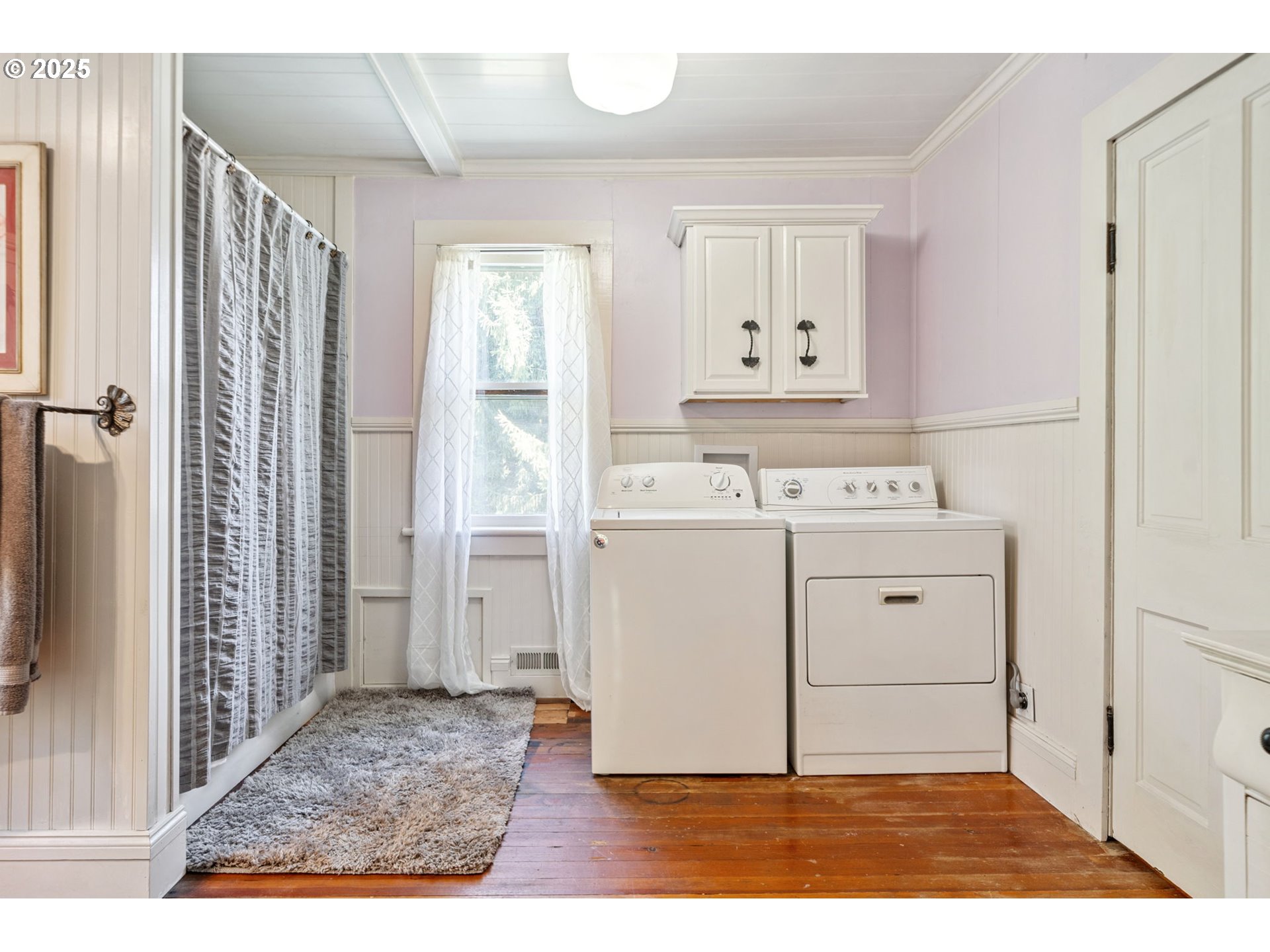 12040 Southeast Revenue Road Boring, OR 97009 - Photo 20 of 46 a utility room with cabinets washer and dryer